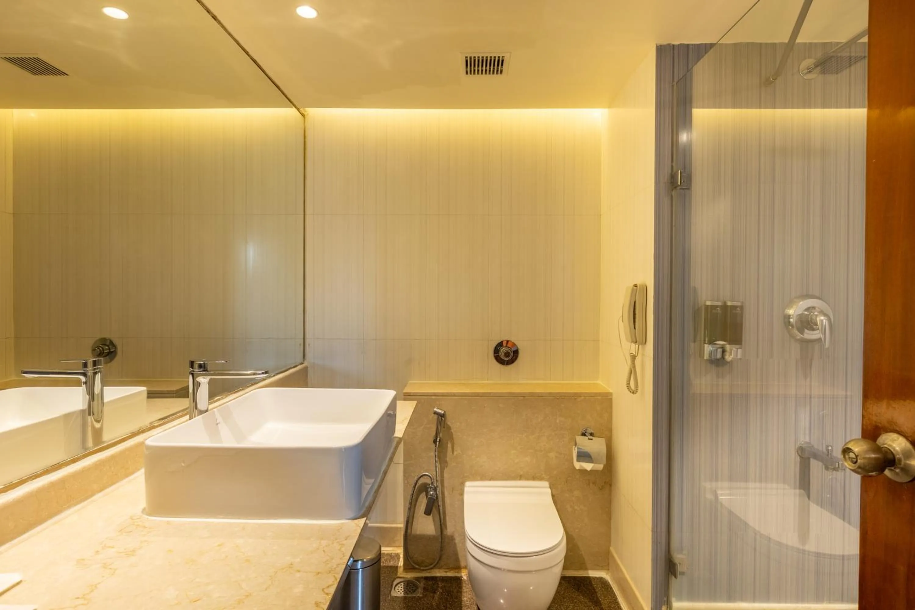 Bathroom in Citadel Sarovar Portico Bengaluru