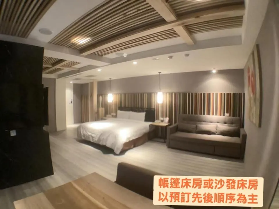 Bed in OUGE Motel Kaohsiung