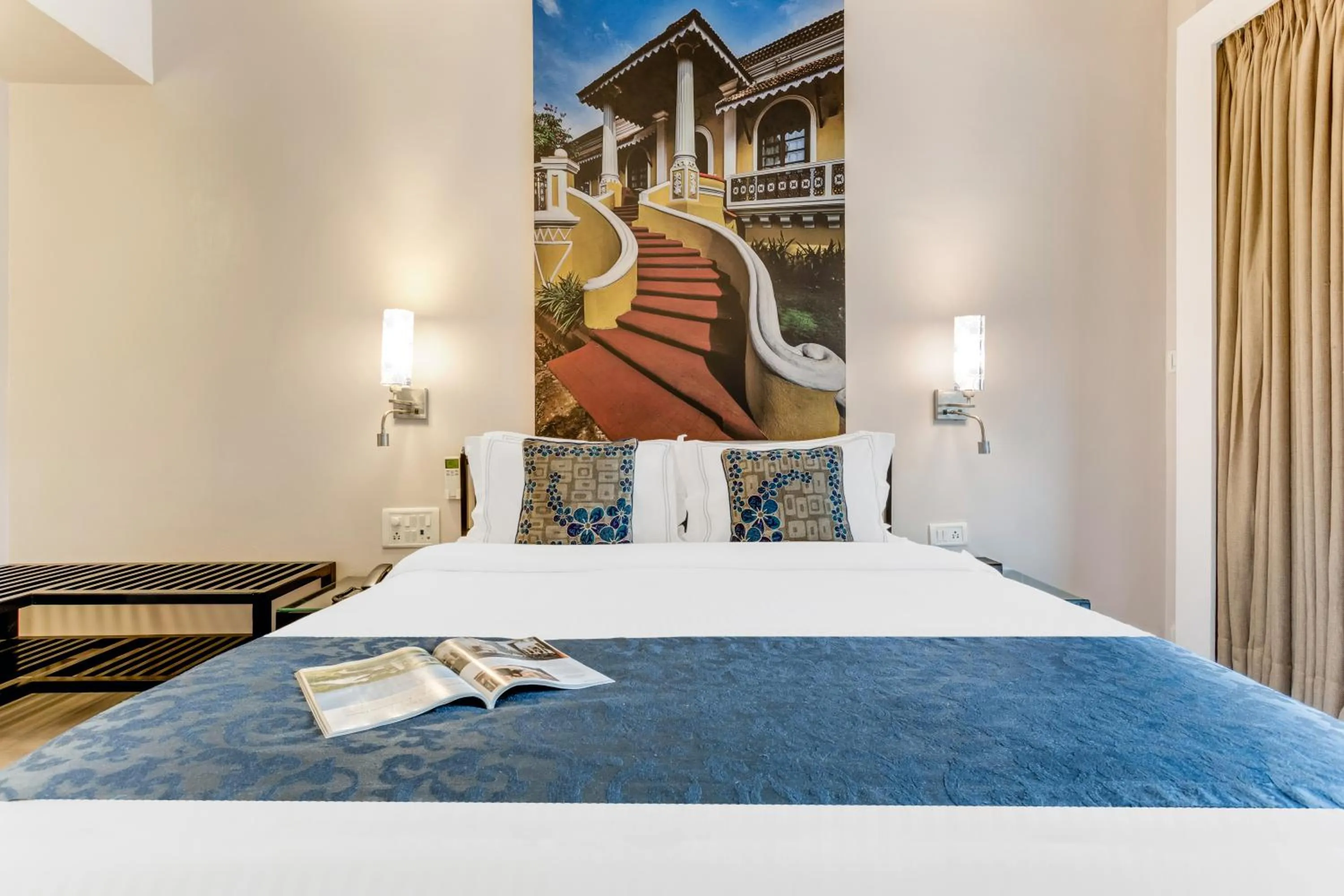 Bed in Whispering Palms Beach Resort