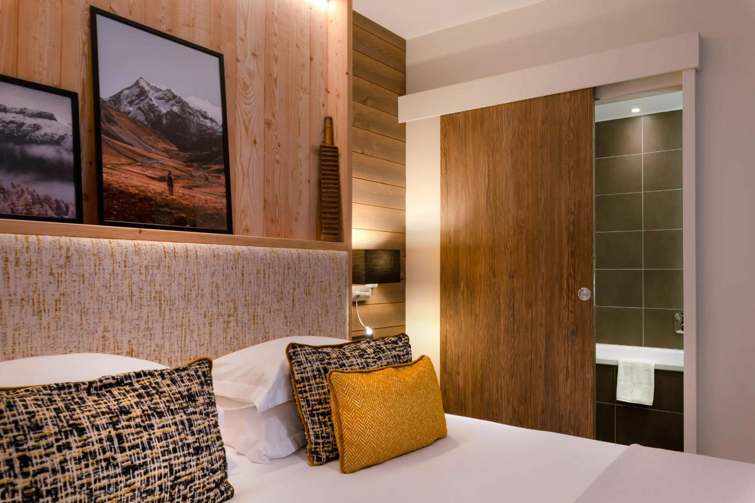 Bathroom, Bed in ILY Hotels & Spa La Rosiere
