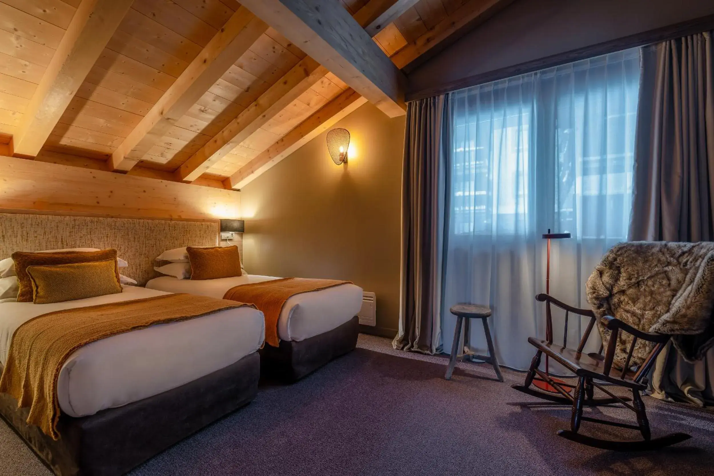 Bed in ILY Hotels & Spa La Rosiere Bed in ILY Hotels & Spa La Rosiere