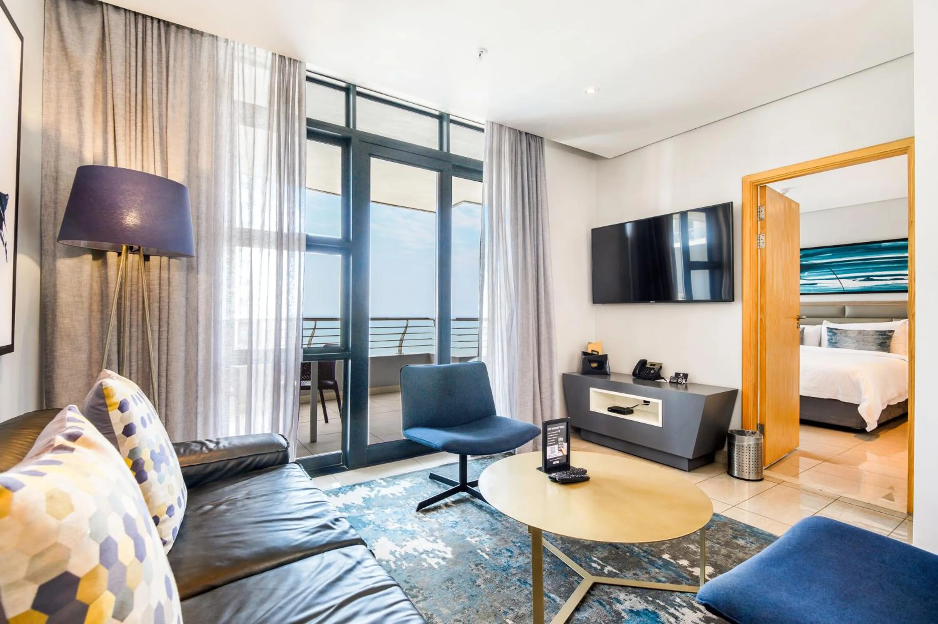 Living room, Bed in The Capital Pearls Hotel