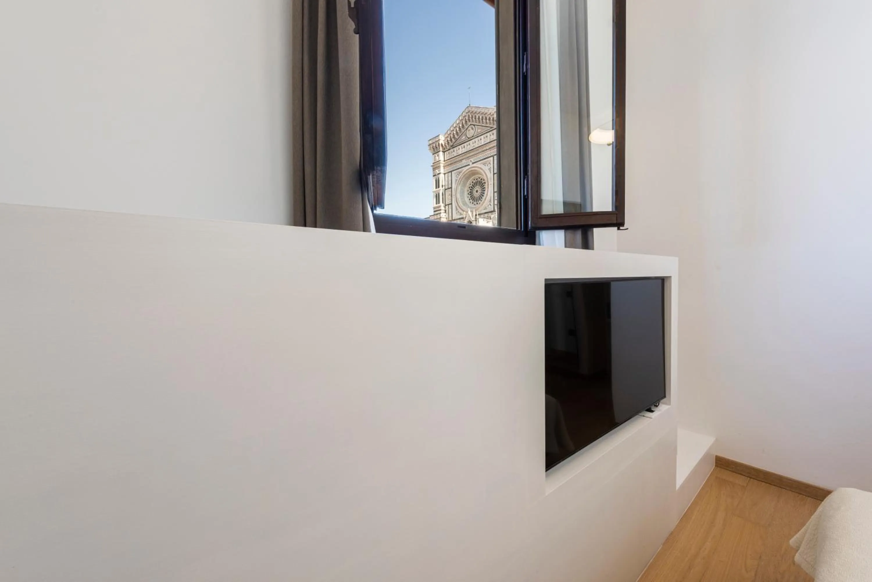 TV and multimedia in B&B Soggiorno Battistero