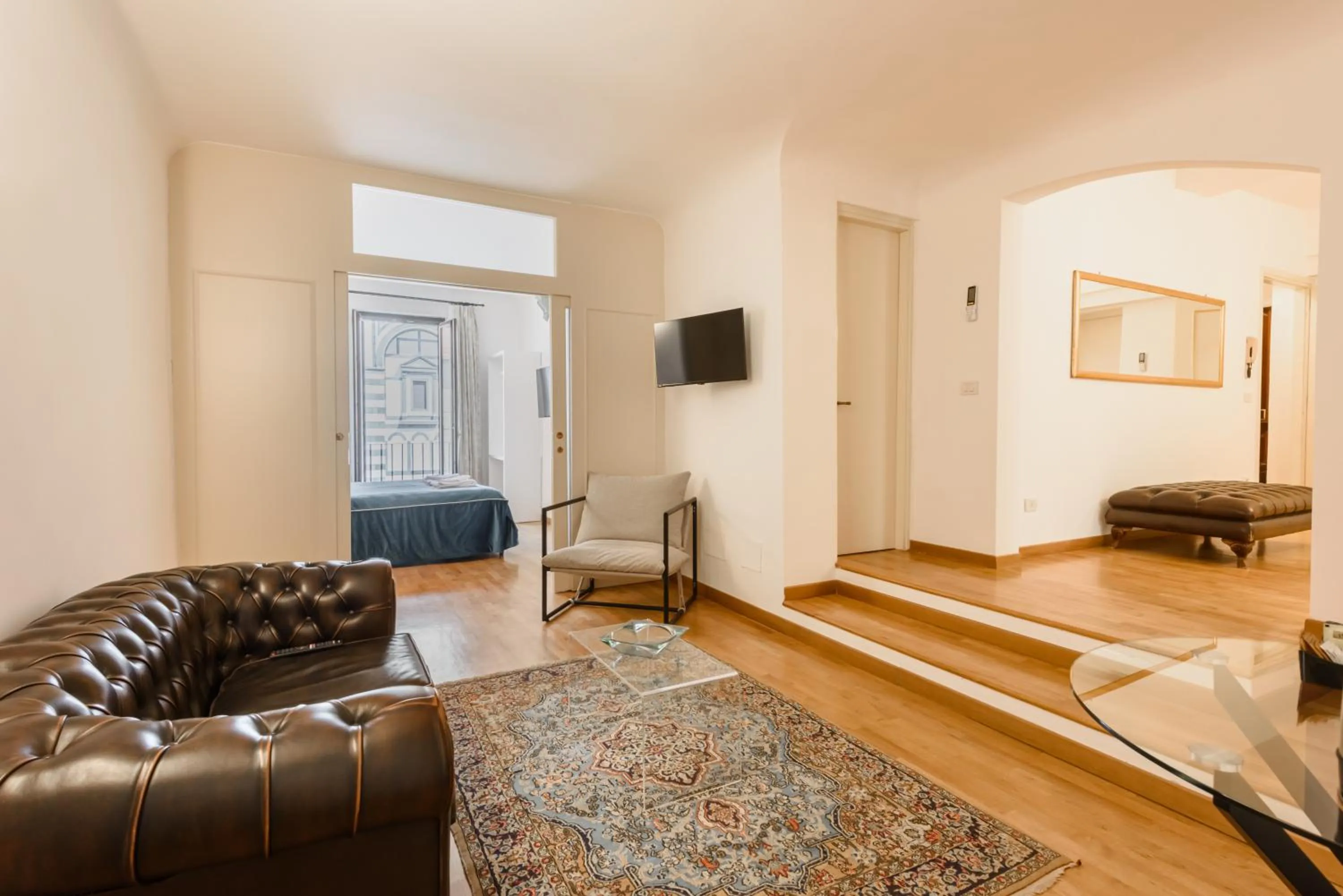 Communal lounge/ TV room, Bed in B&B Soggiorno Battistero