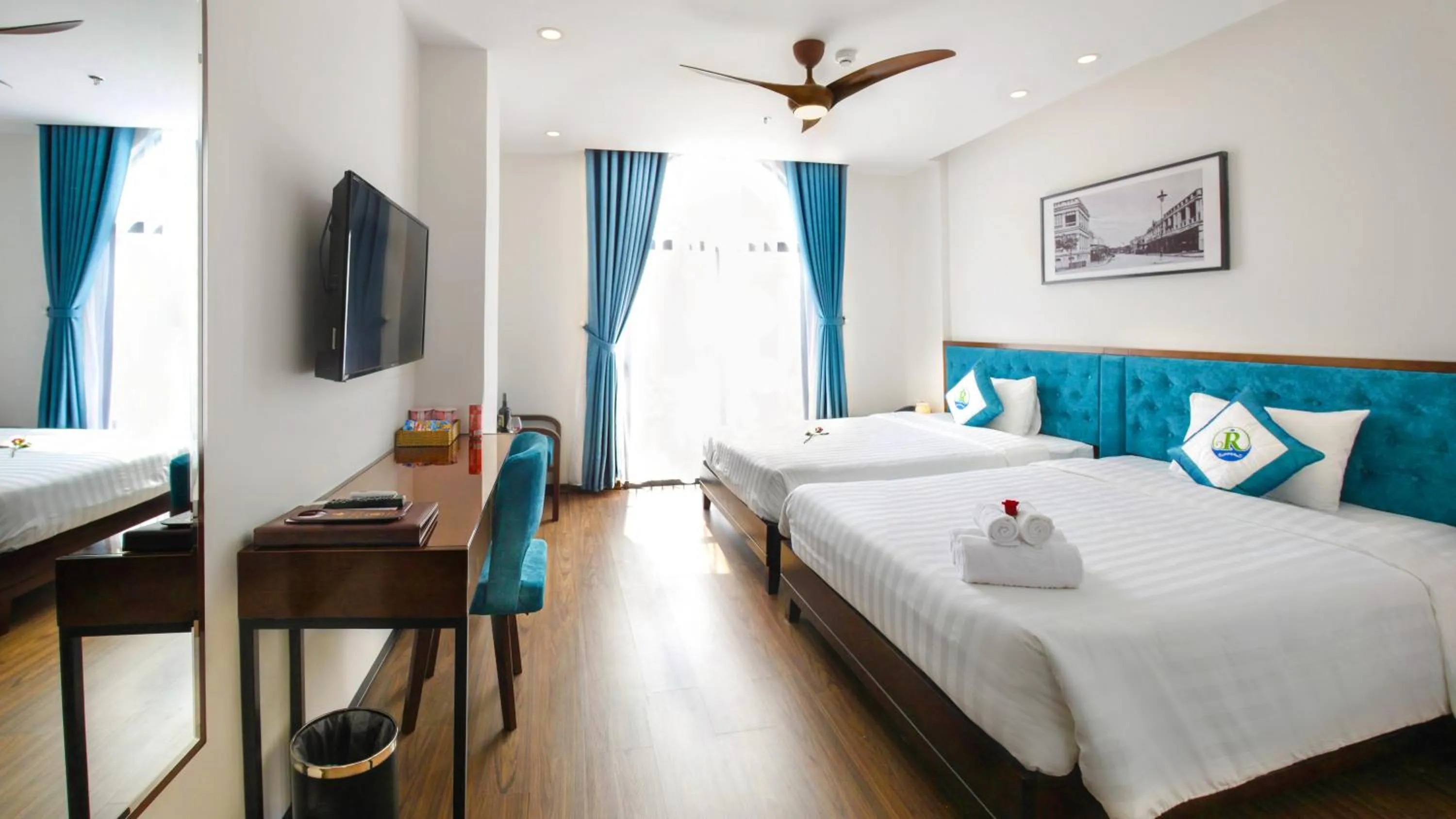 Photo of the whole room, Bed in Ritzy Boutique Hotel Da Nang Beach
