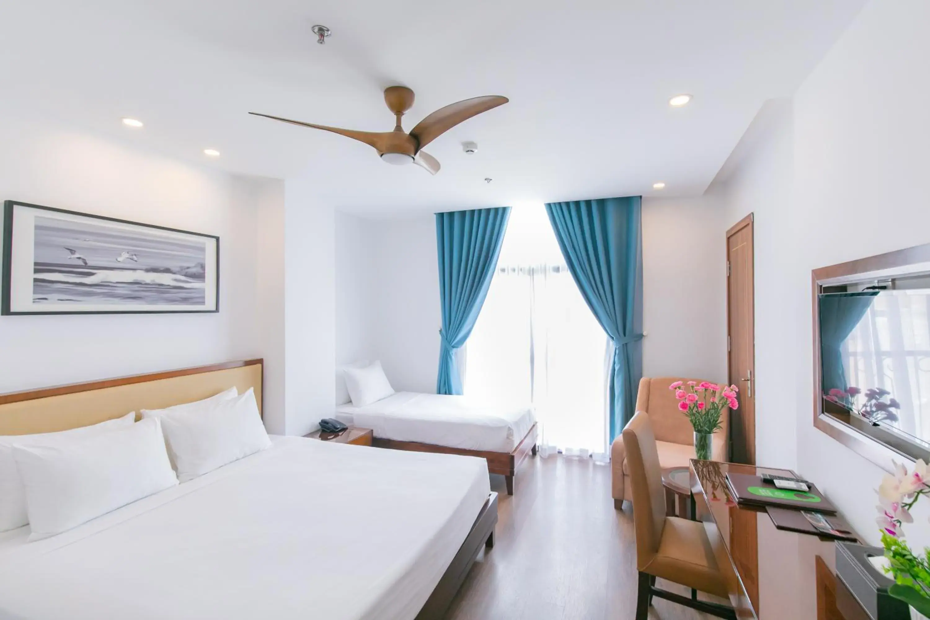Deluxe Triple Room in Ritzy Boutique Hotel Da Nang Beach Deluxe Triple Room in Ritzy Boutique Hotel Da Nang Beach