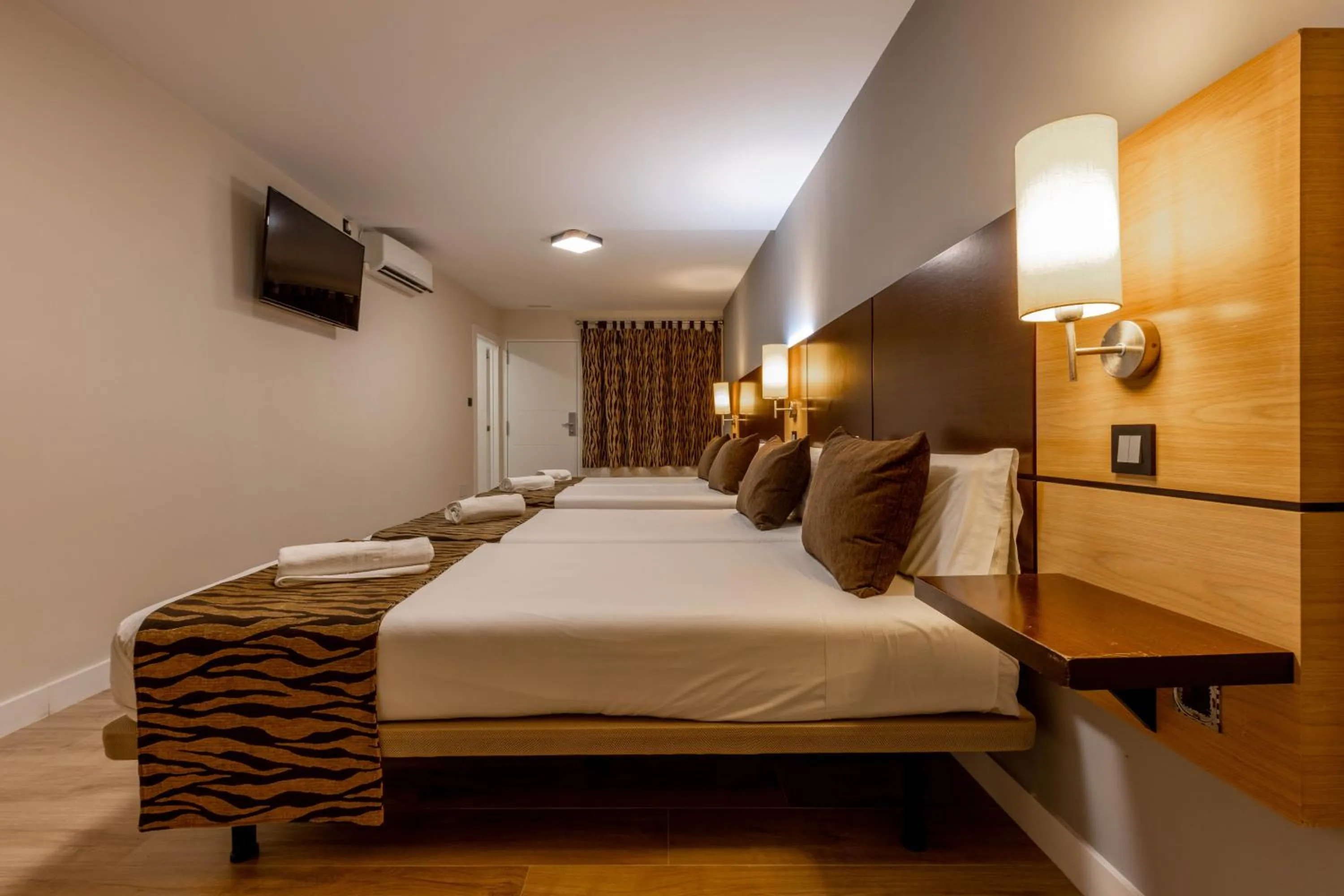 Bed in Hotel Copacabana Tarifa Beach