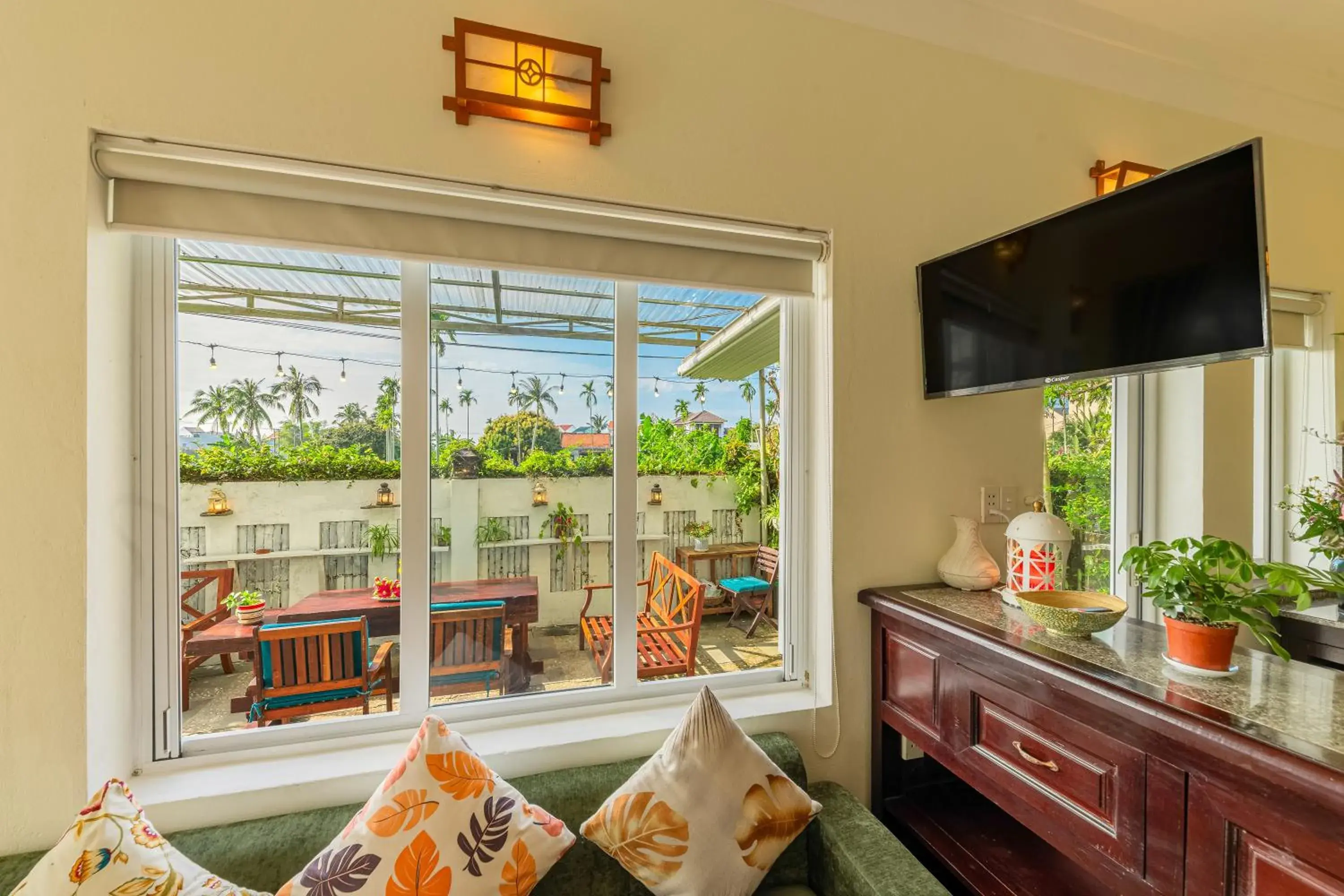 Communal lounge/ TV room in HA Devan Hoian Pool Villa Communal lounge/ TV room in HA Devan Hoian Pool Villa