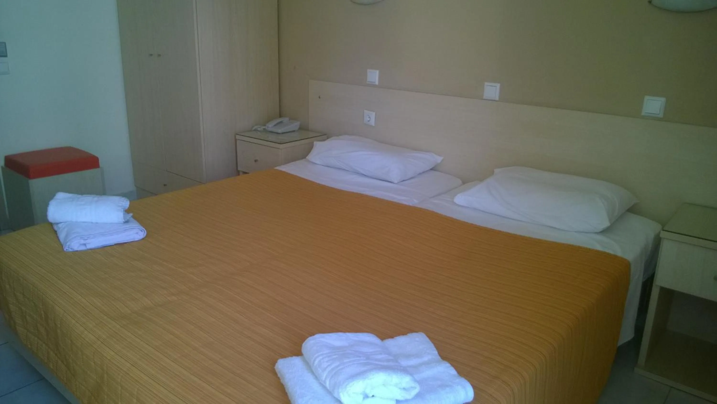 Bed in Amaryllis Hotel