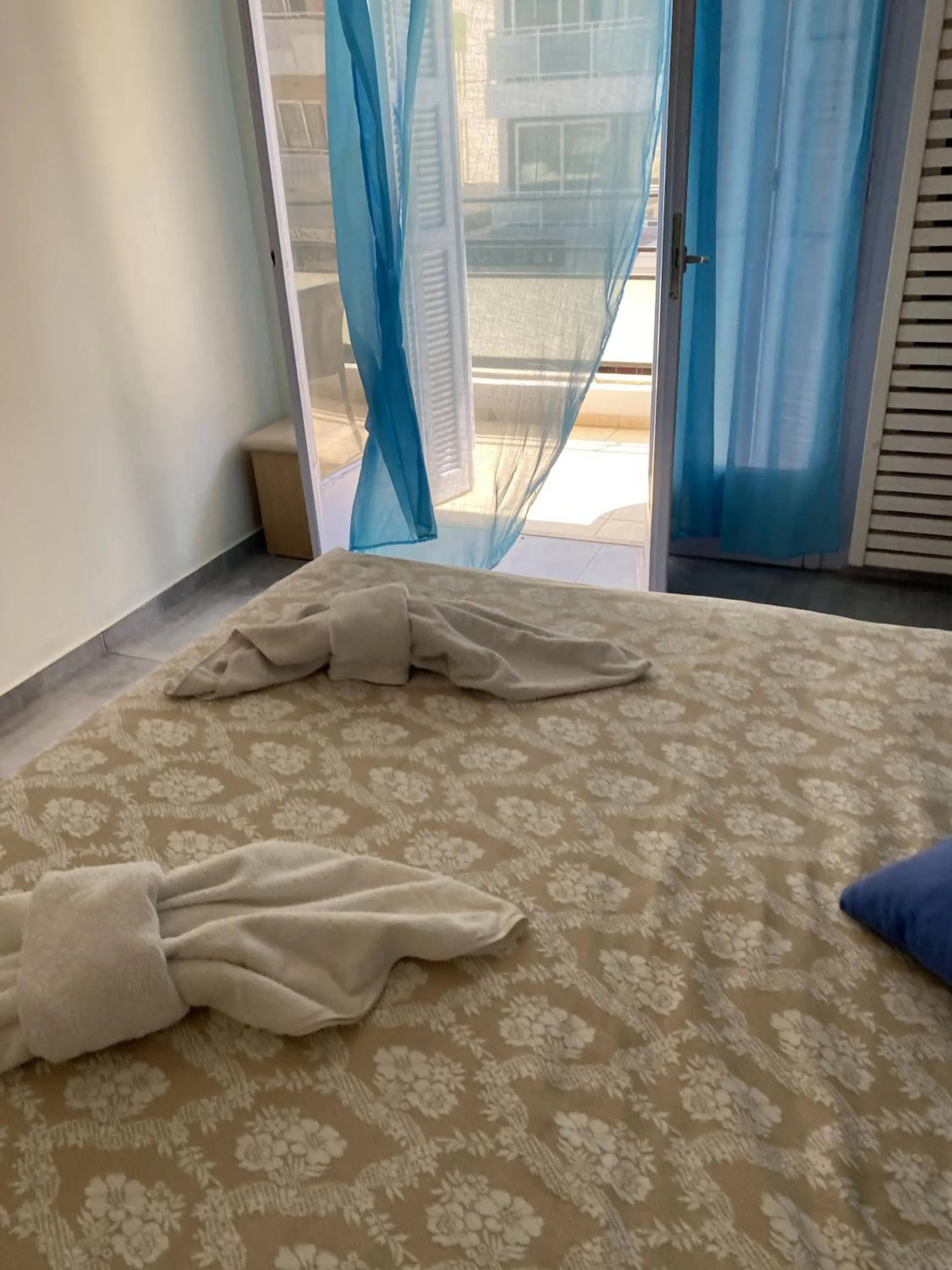 Bed in Amaryllis Hotel