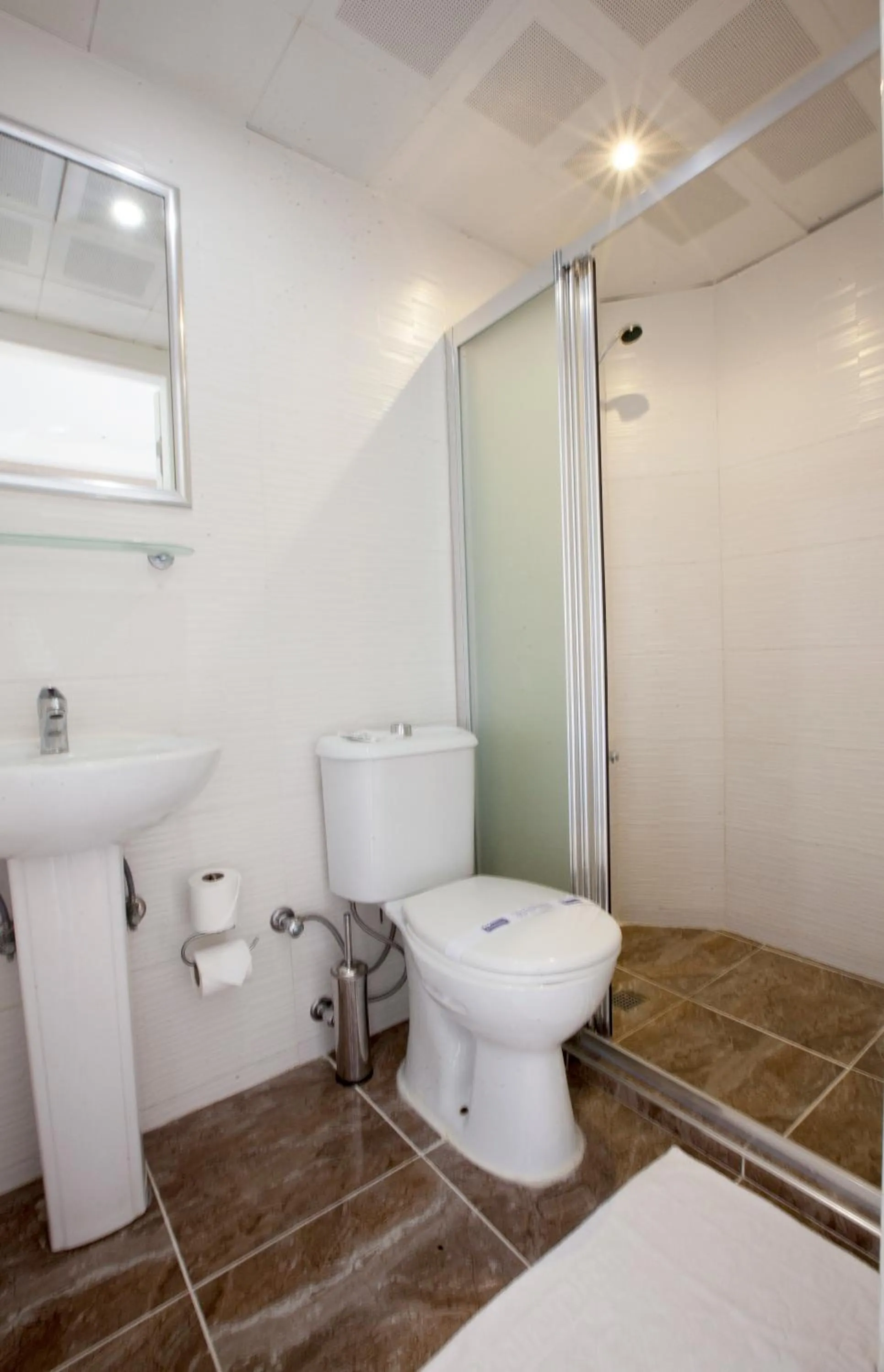 Bathroom in Nasa Flora Hotel