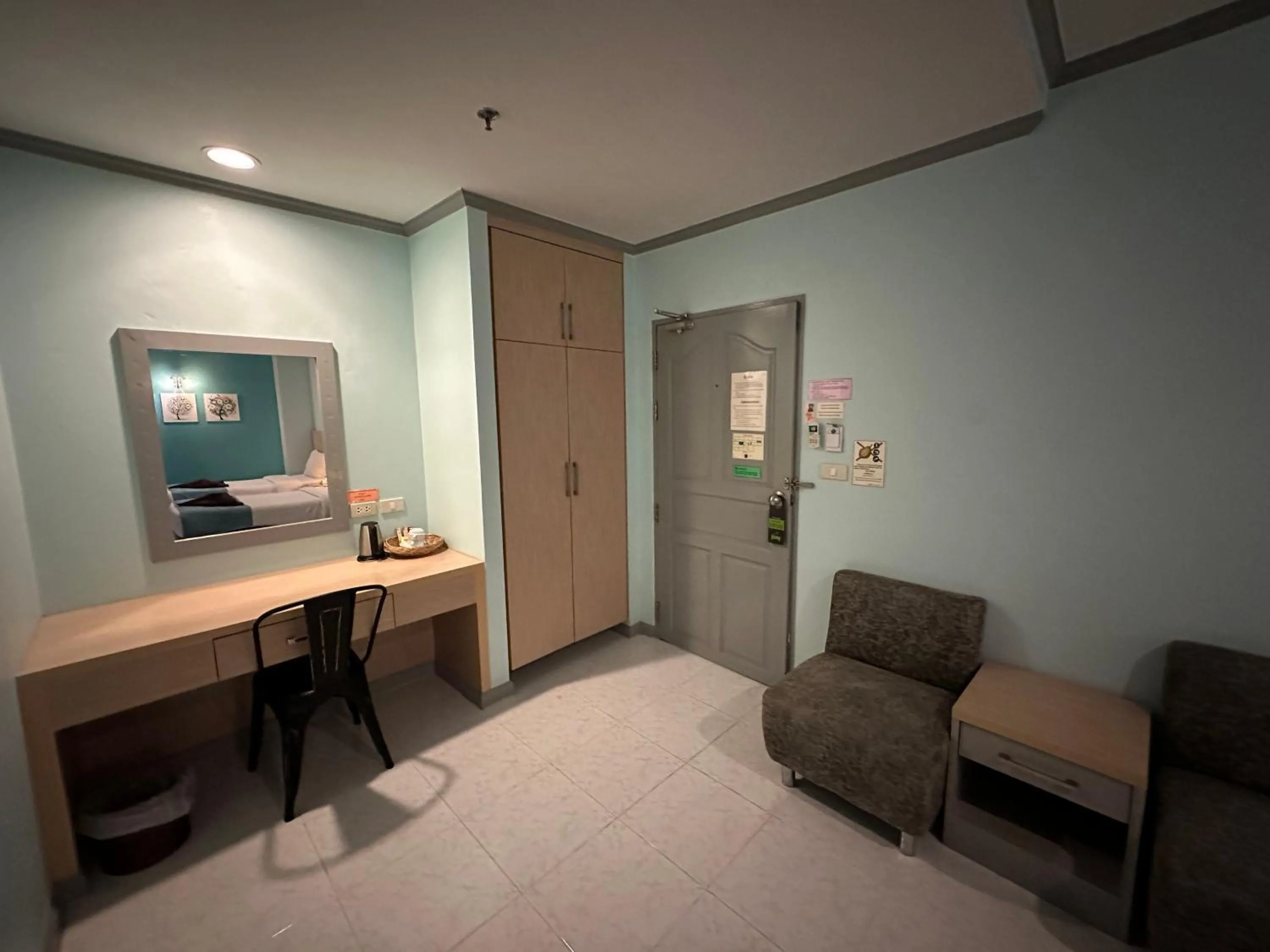 Seating area in Thipurai City Hotel