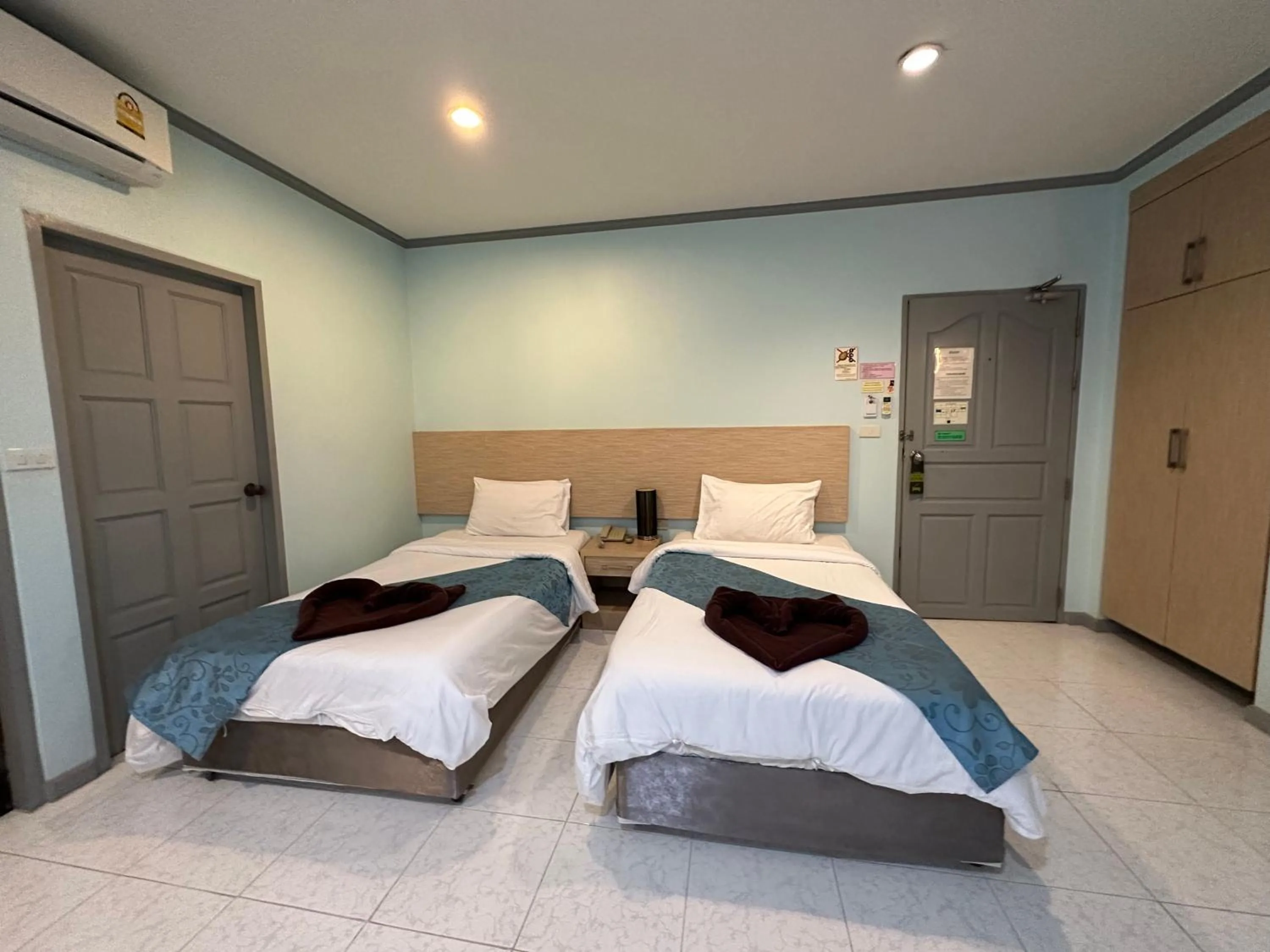 Photo of the whole room, Bed in Thipurai City Hotel