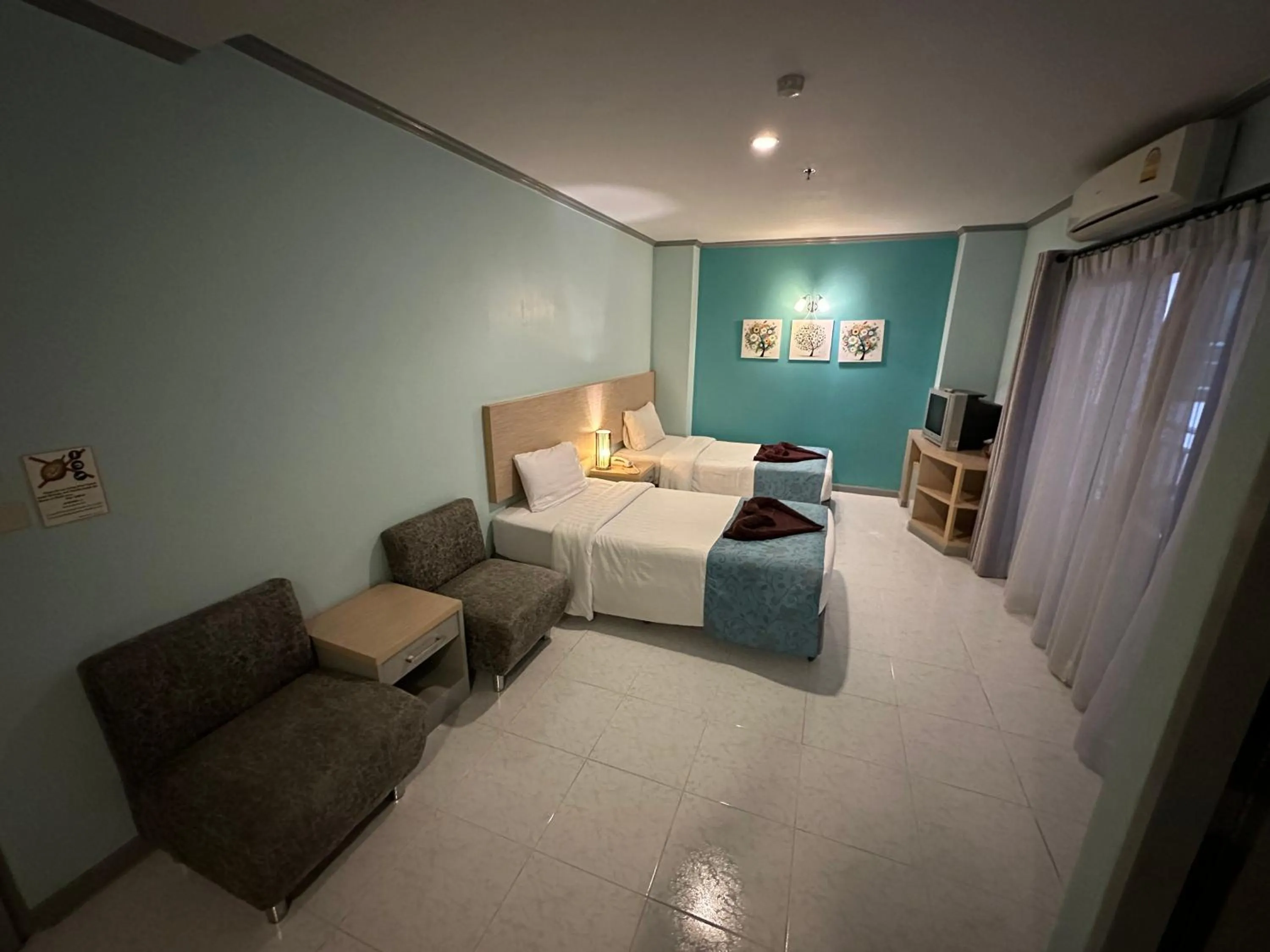 Photo of the whole room, Bed in Thipurai City Hotel