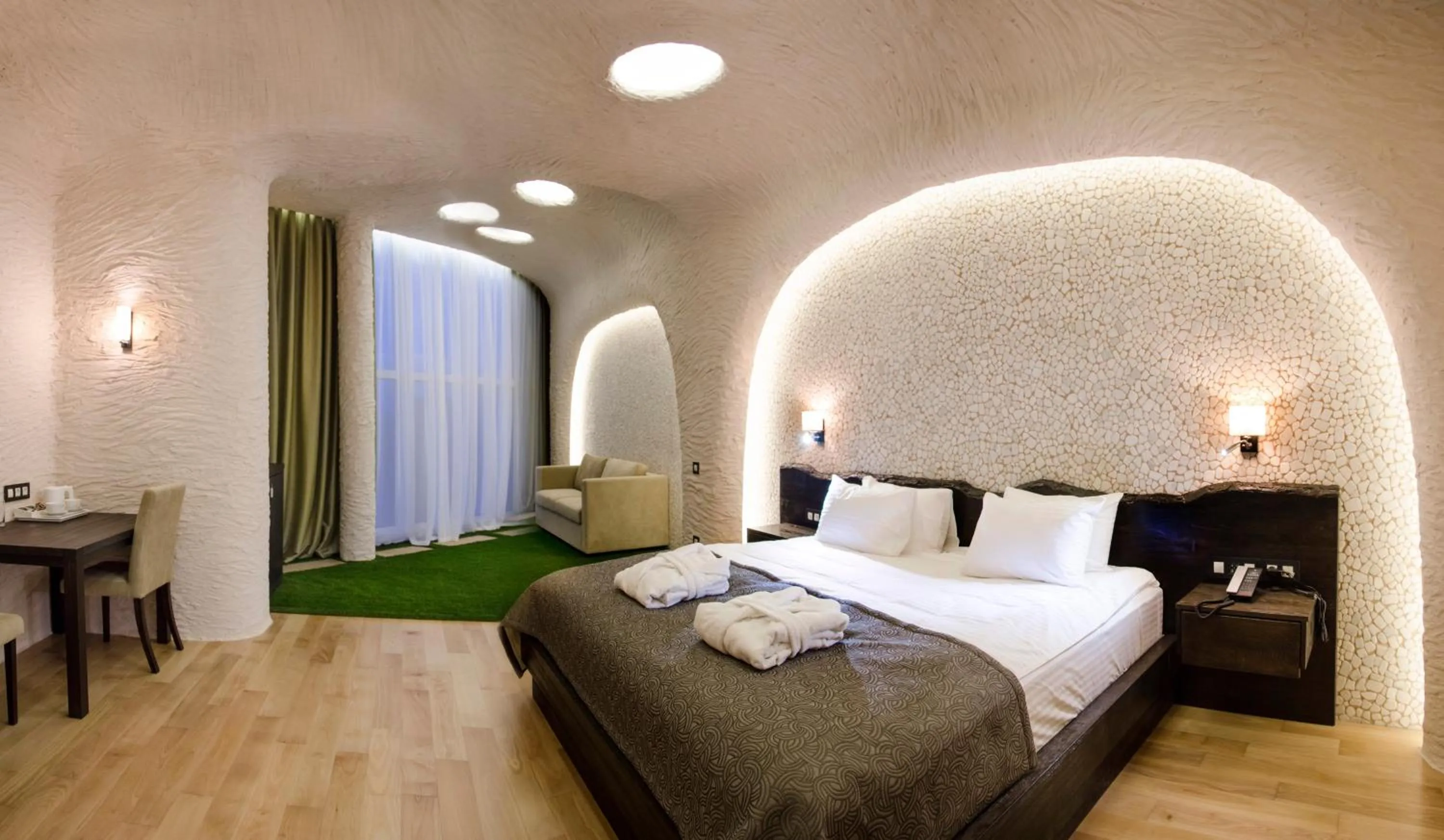 Bed in Tsunami Spa Hotel