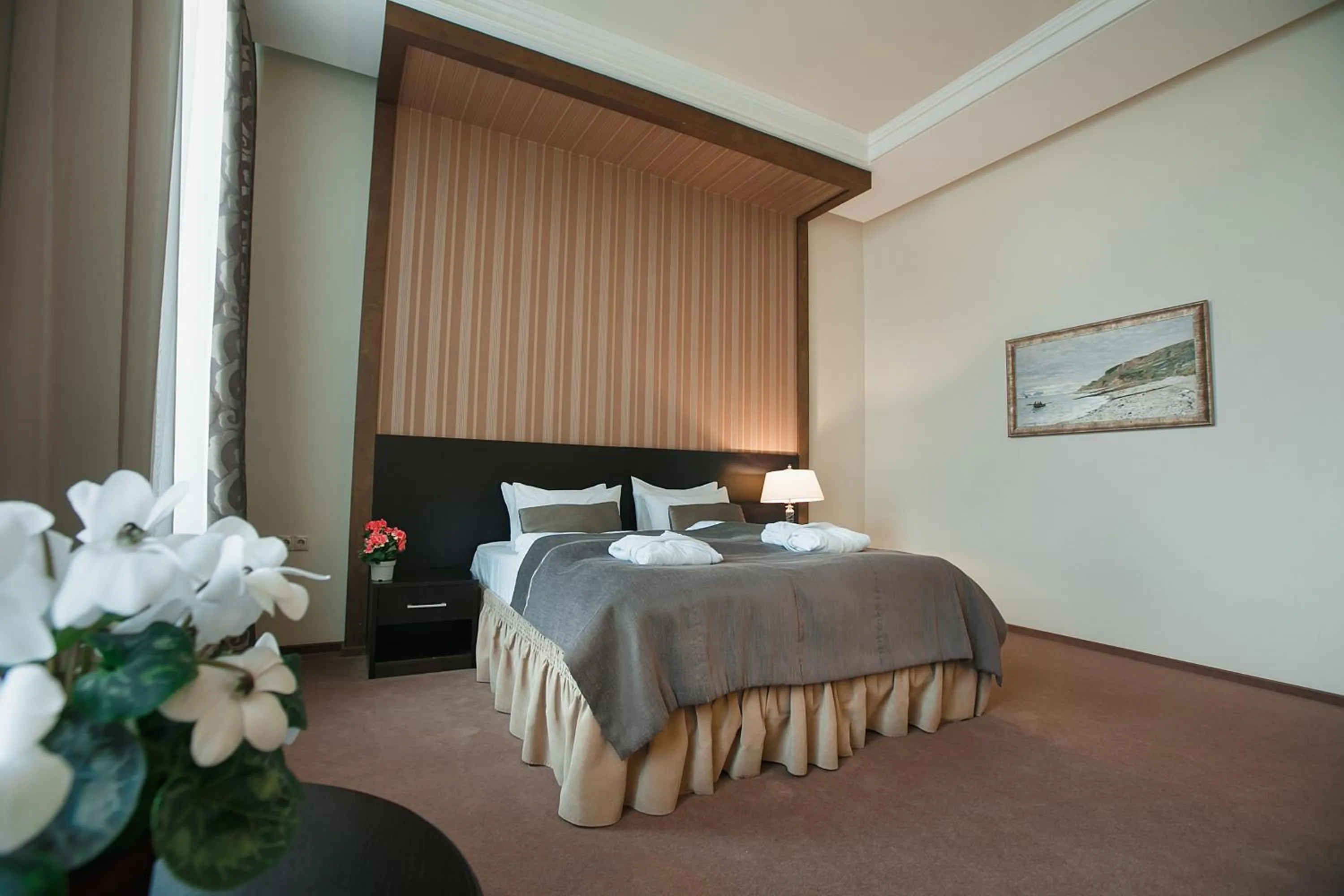 Bed in Tsunami Spa Hotel