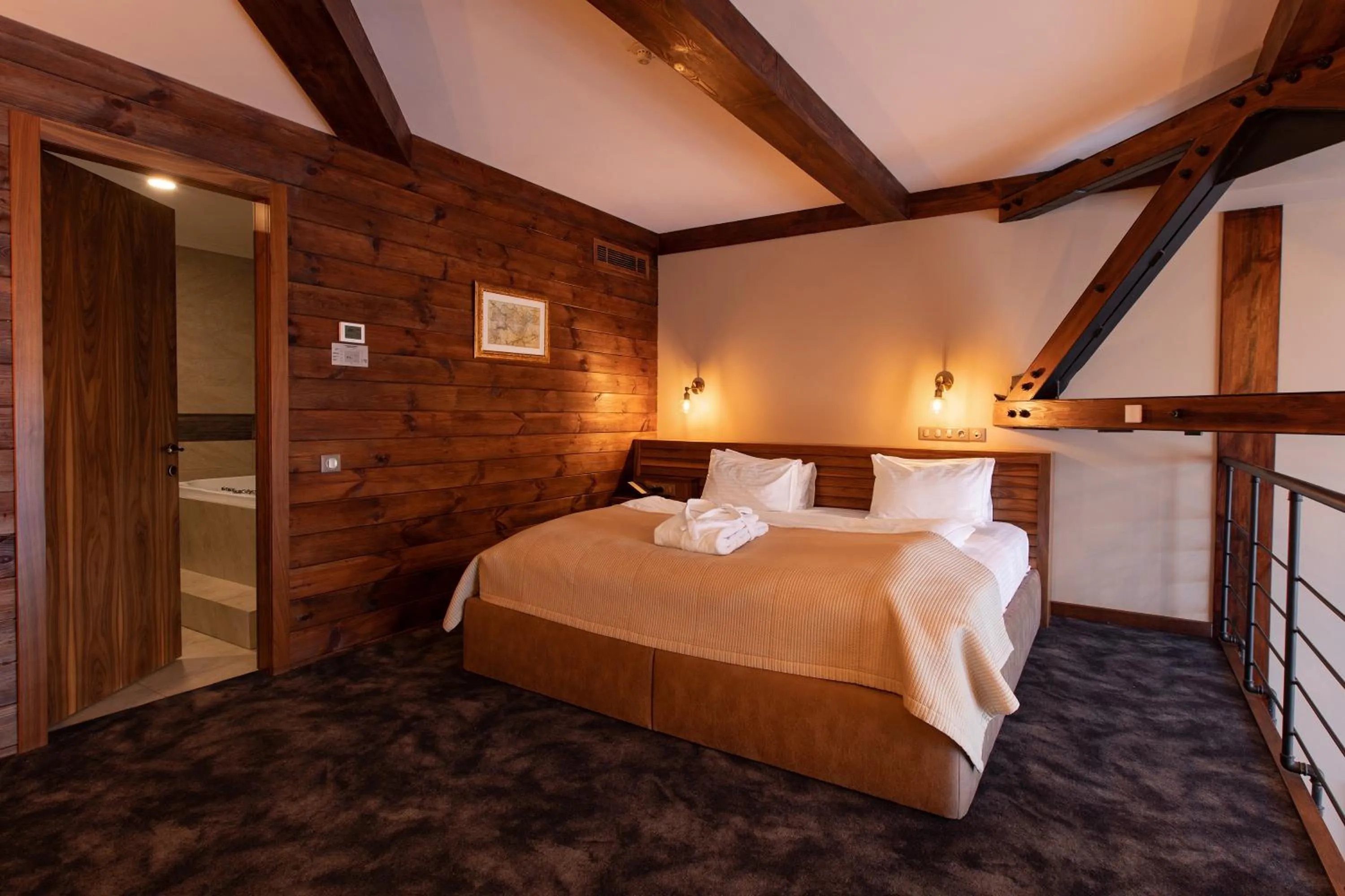 Bed in Tsunami Spa Hotel