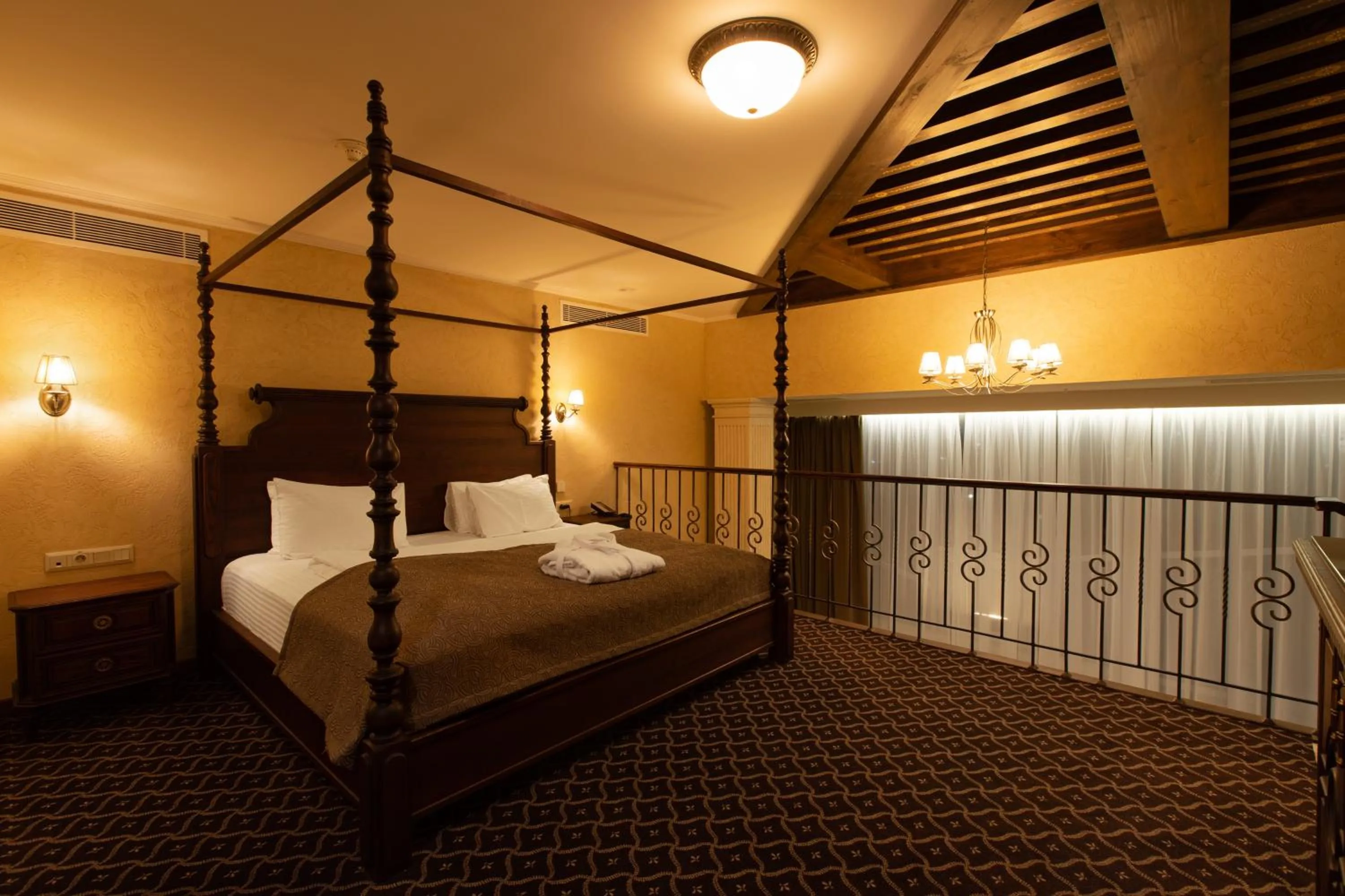 Bed in Tsunami Spa Hotel