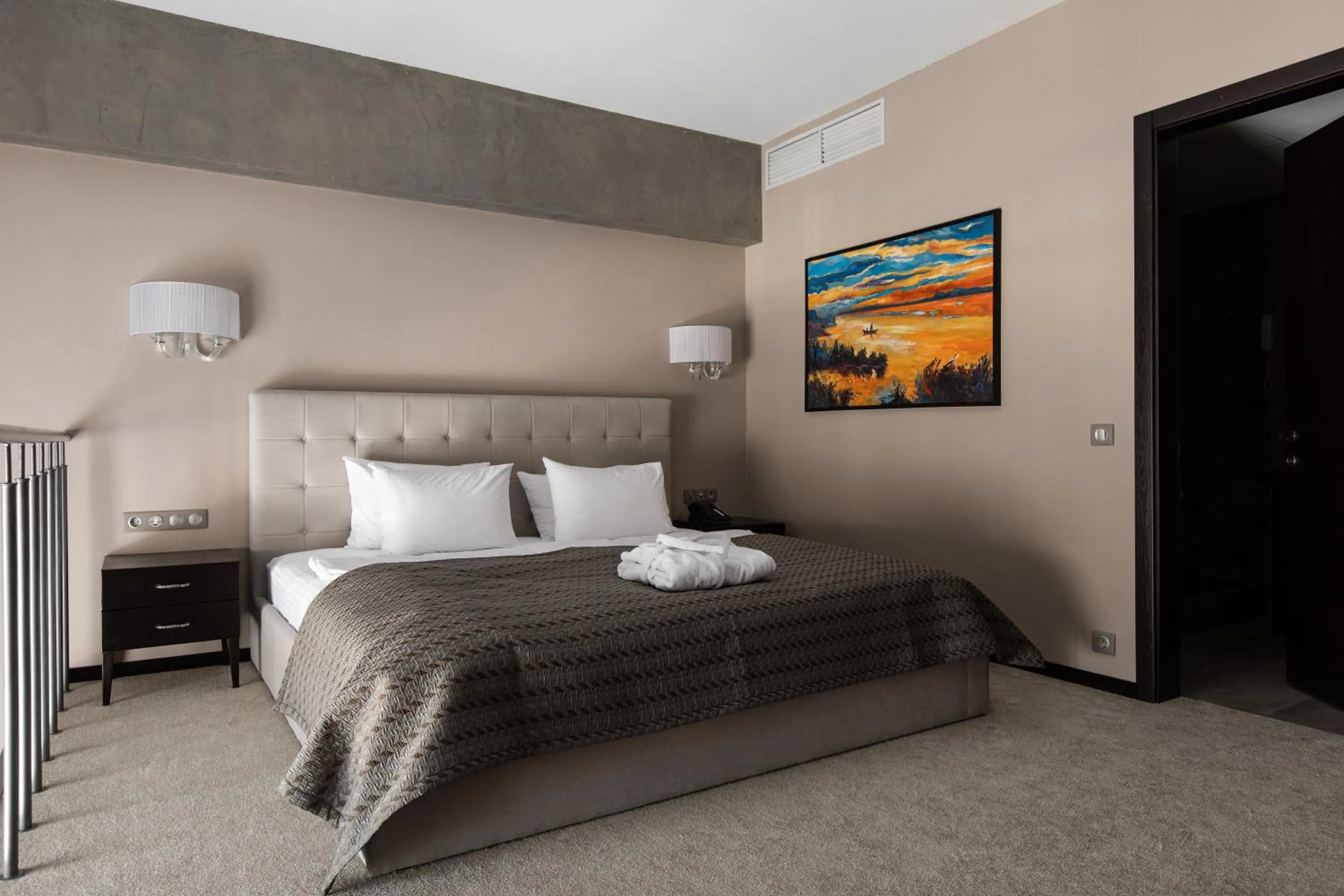 Bed in Tsunami Spa Hotel