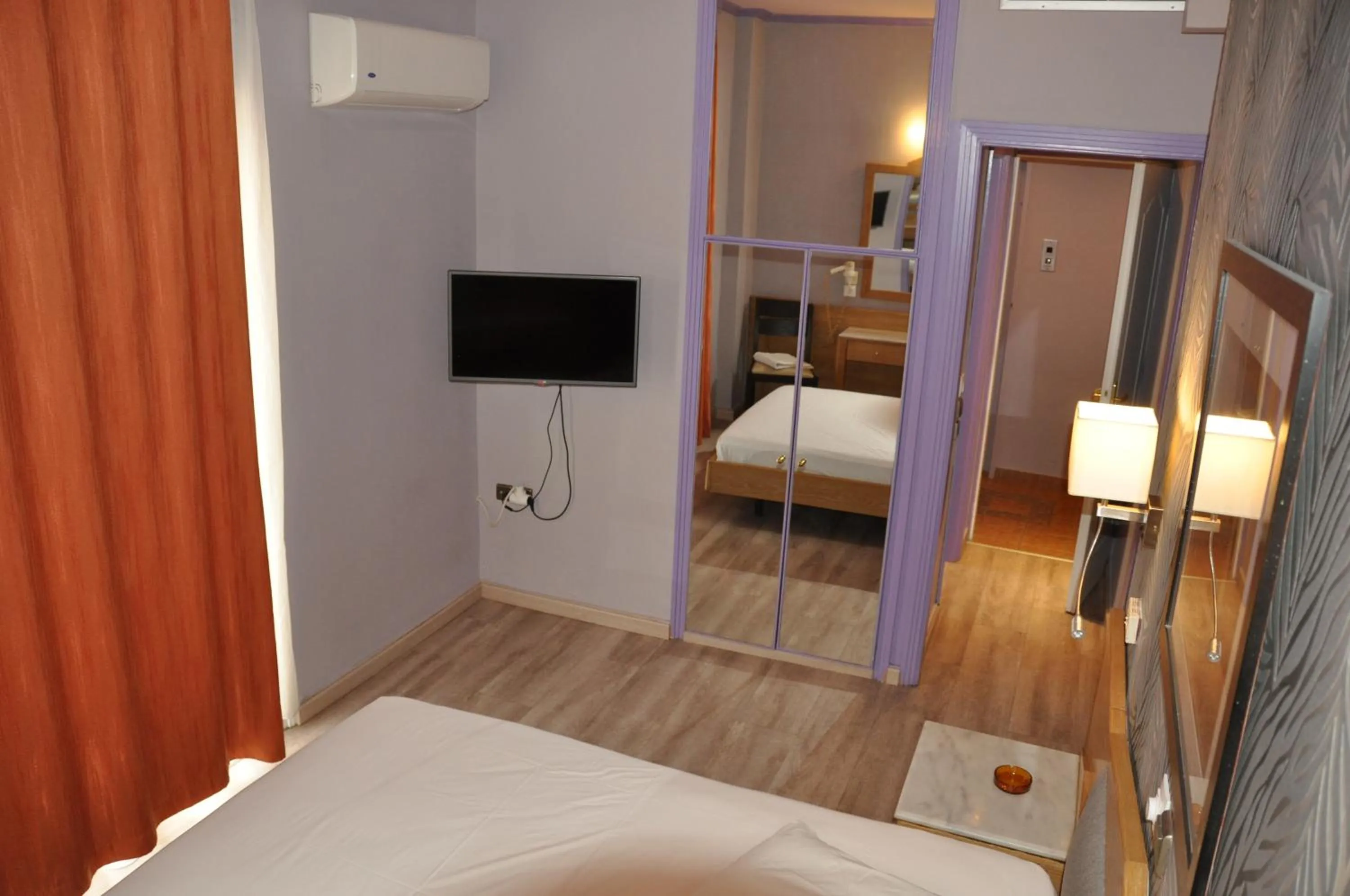 Bed in Eva Hotel Piraeus