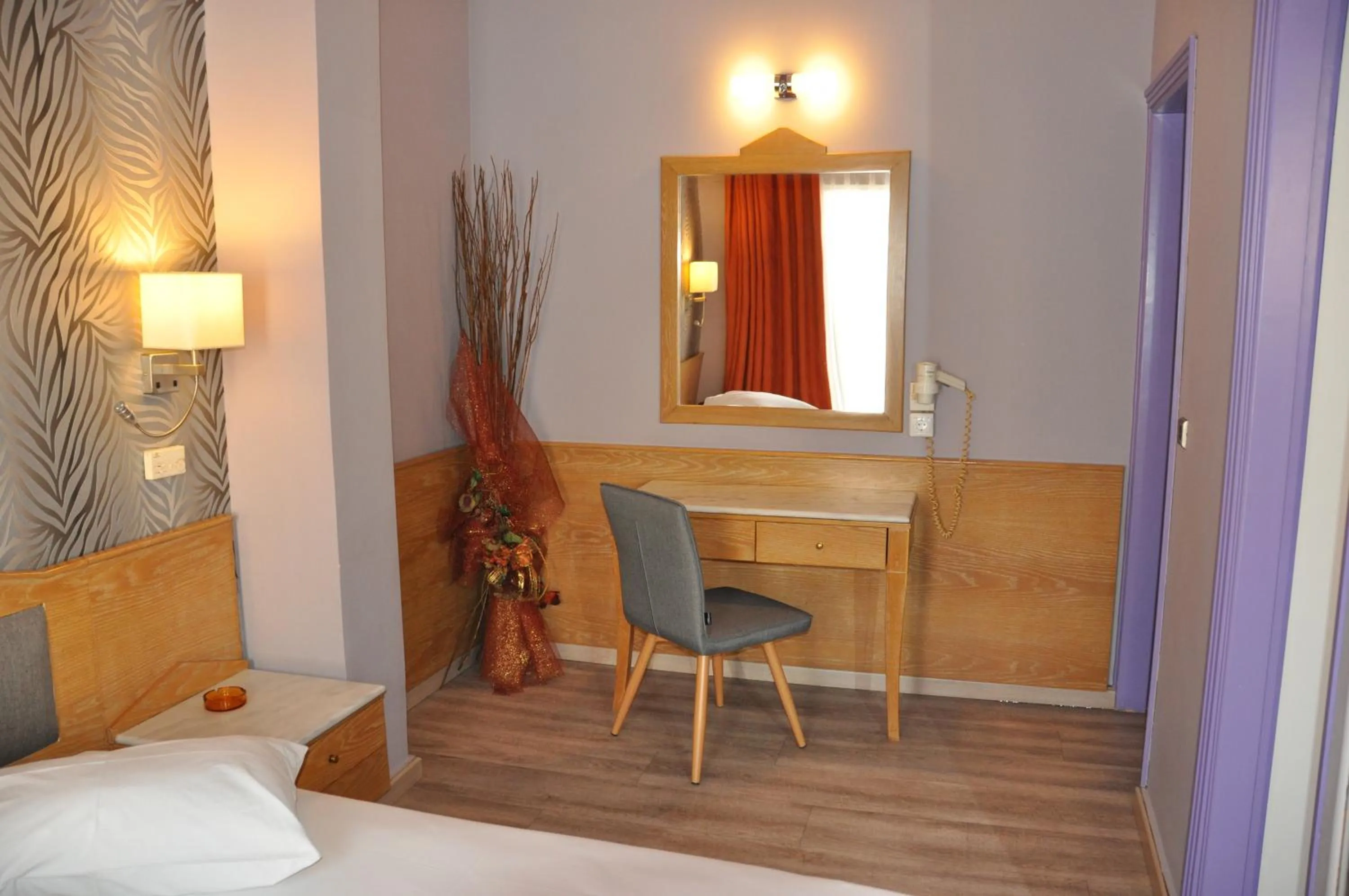 Bed in Eva Hotel Piraeus