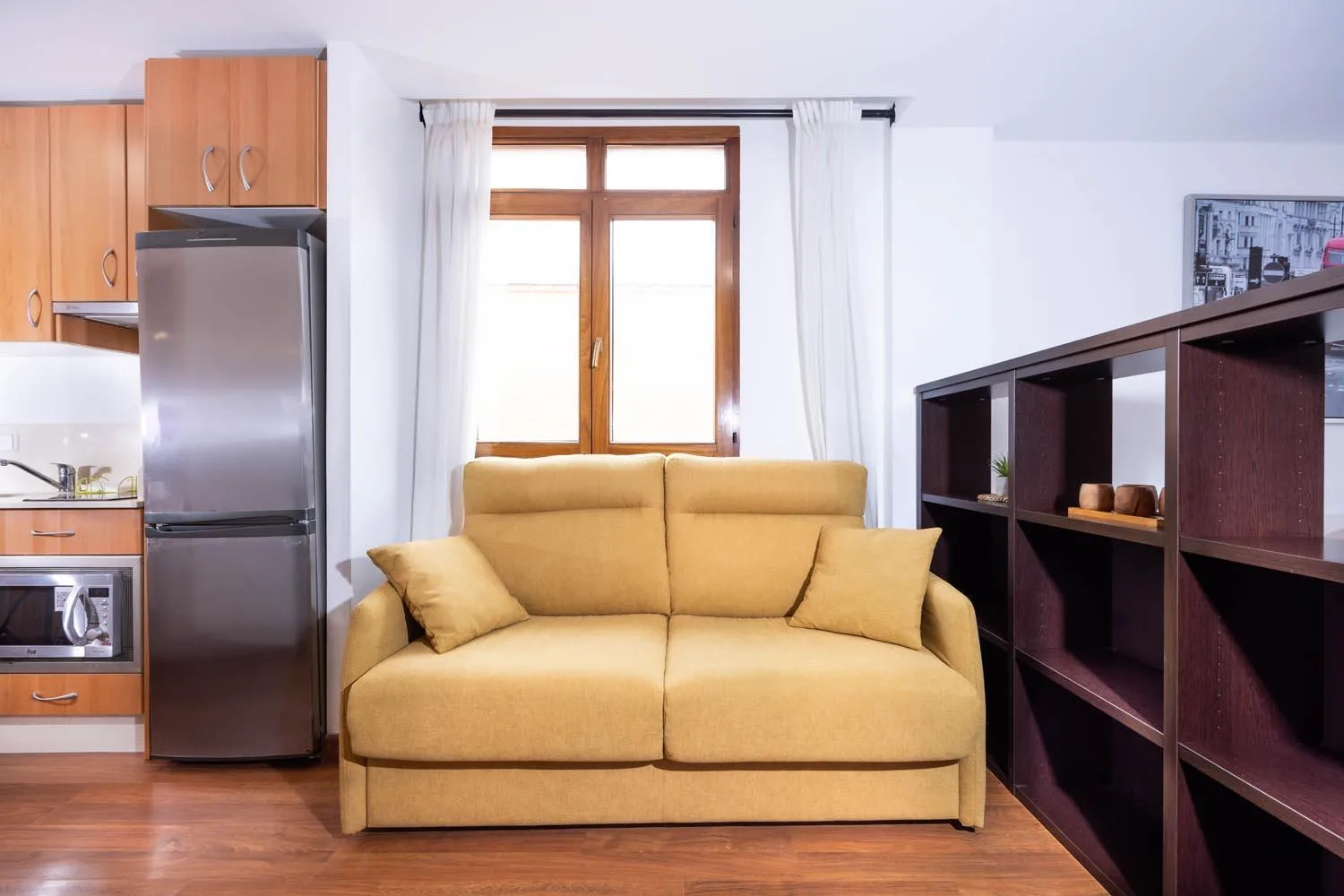 Living room in Apartamentos Turísticos Distrito Romano by CartagenaSpain