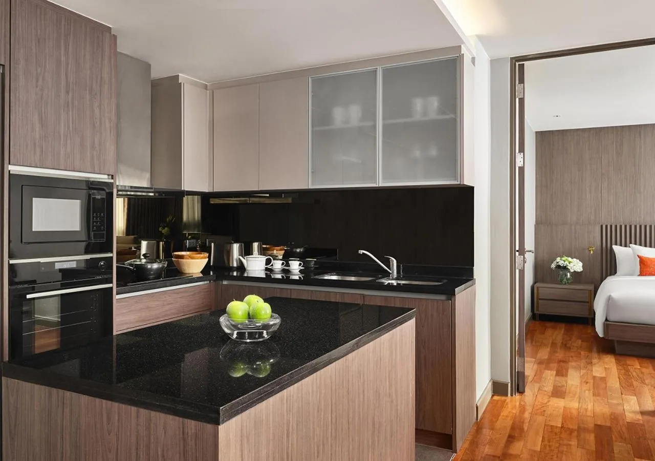 Kitchen or kitchenette, Bed in Fraser Suites Sukhumvit Bangkok