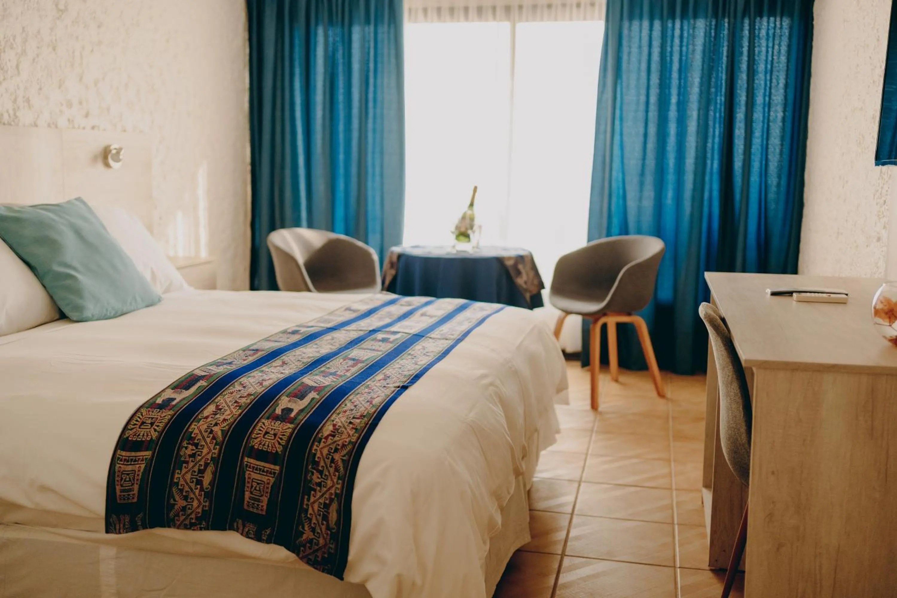 Bed in Panamericana Hotel Arica