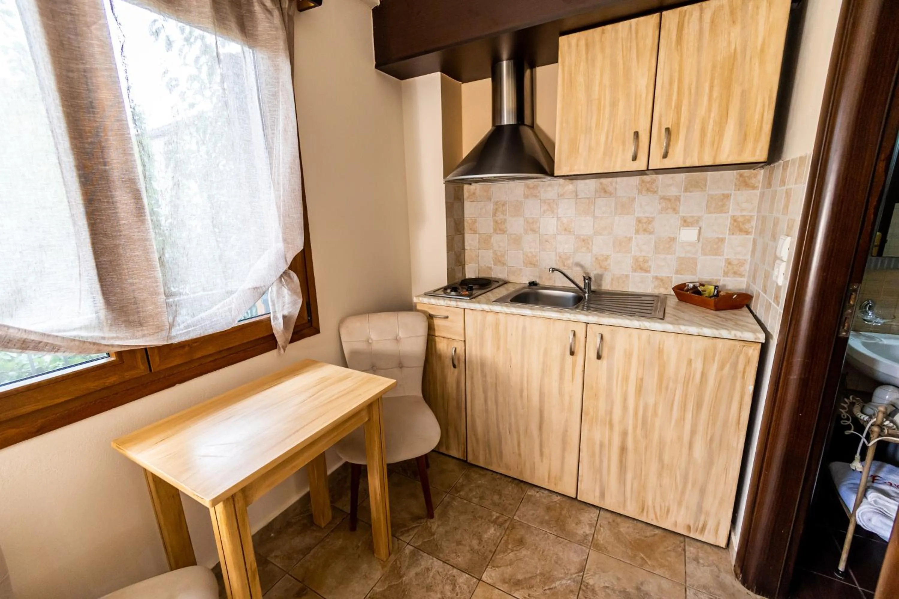 Kitchen or kitchenette in Enastron