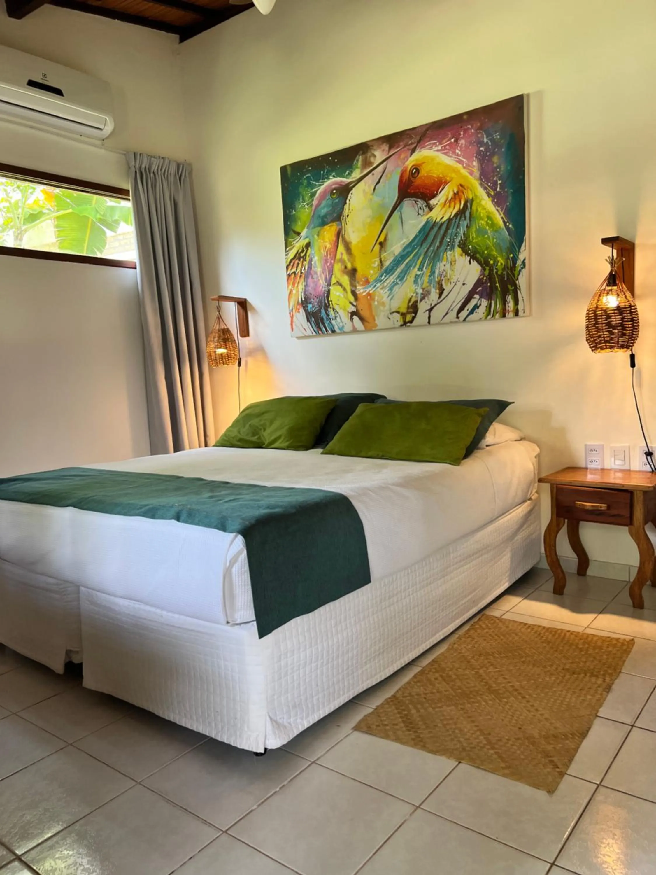 Bed in Pousada Oasis