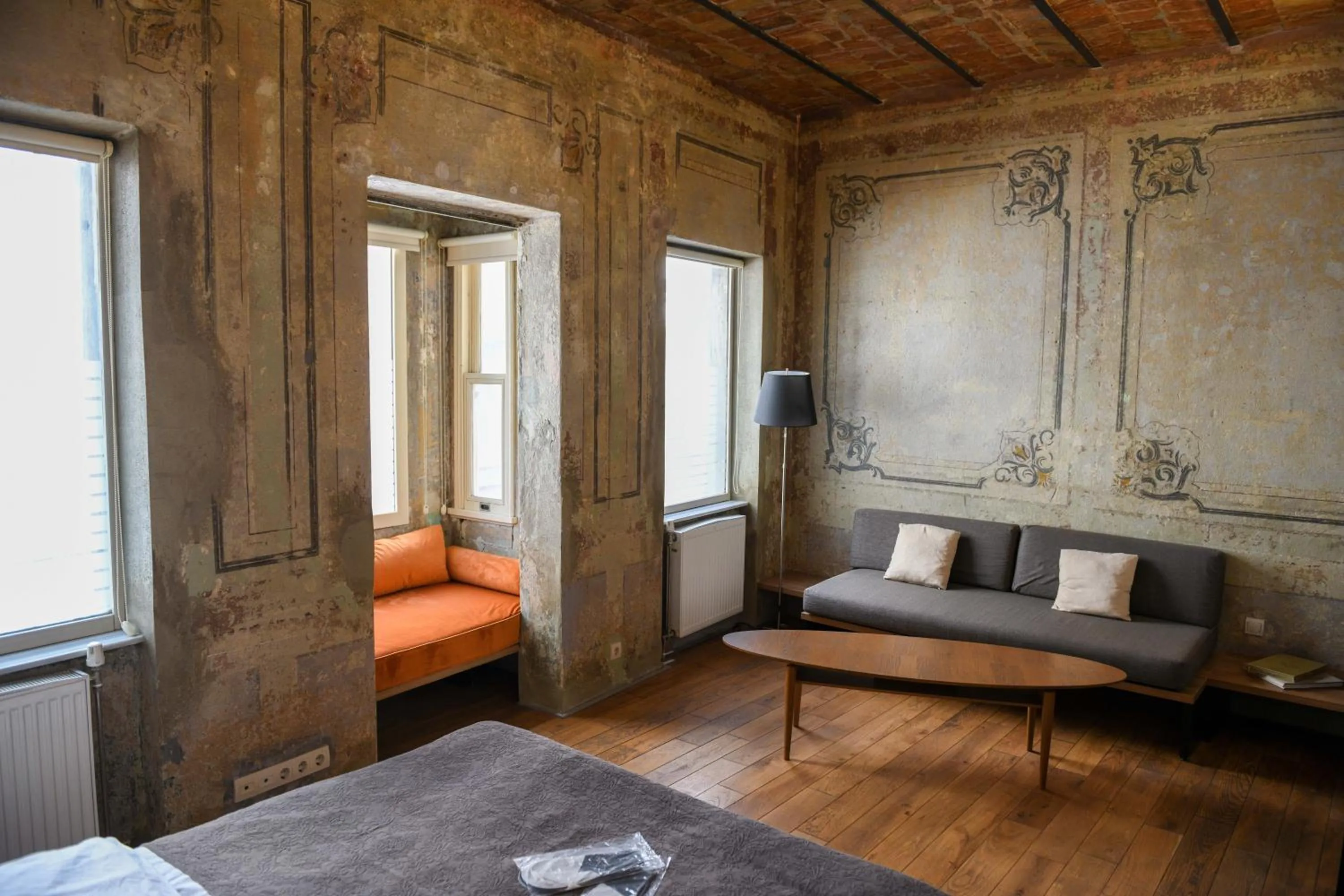 Seating area, Bed in Rooms Galata