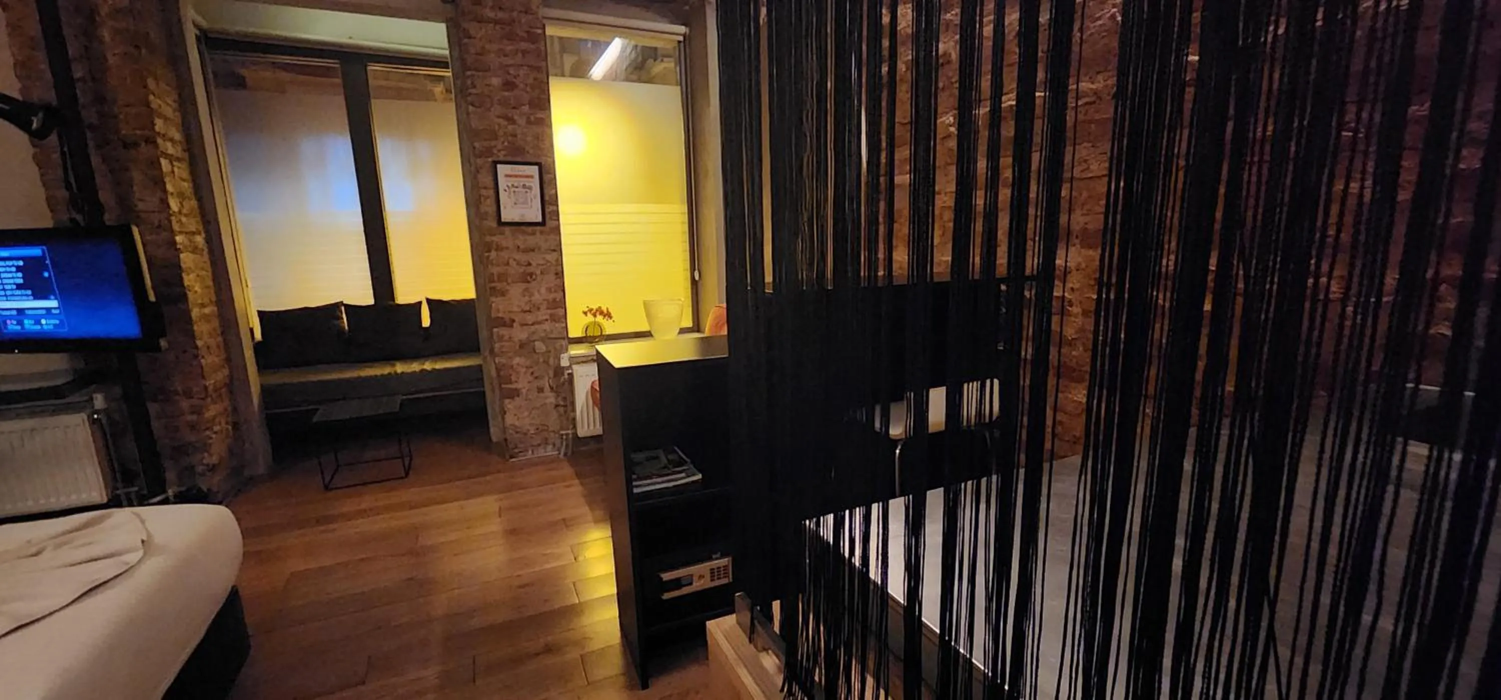 Seating area, Bed in Rooms Galata