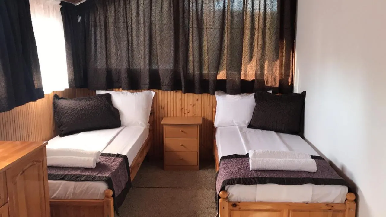 Bed in Aurora Guest House