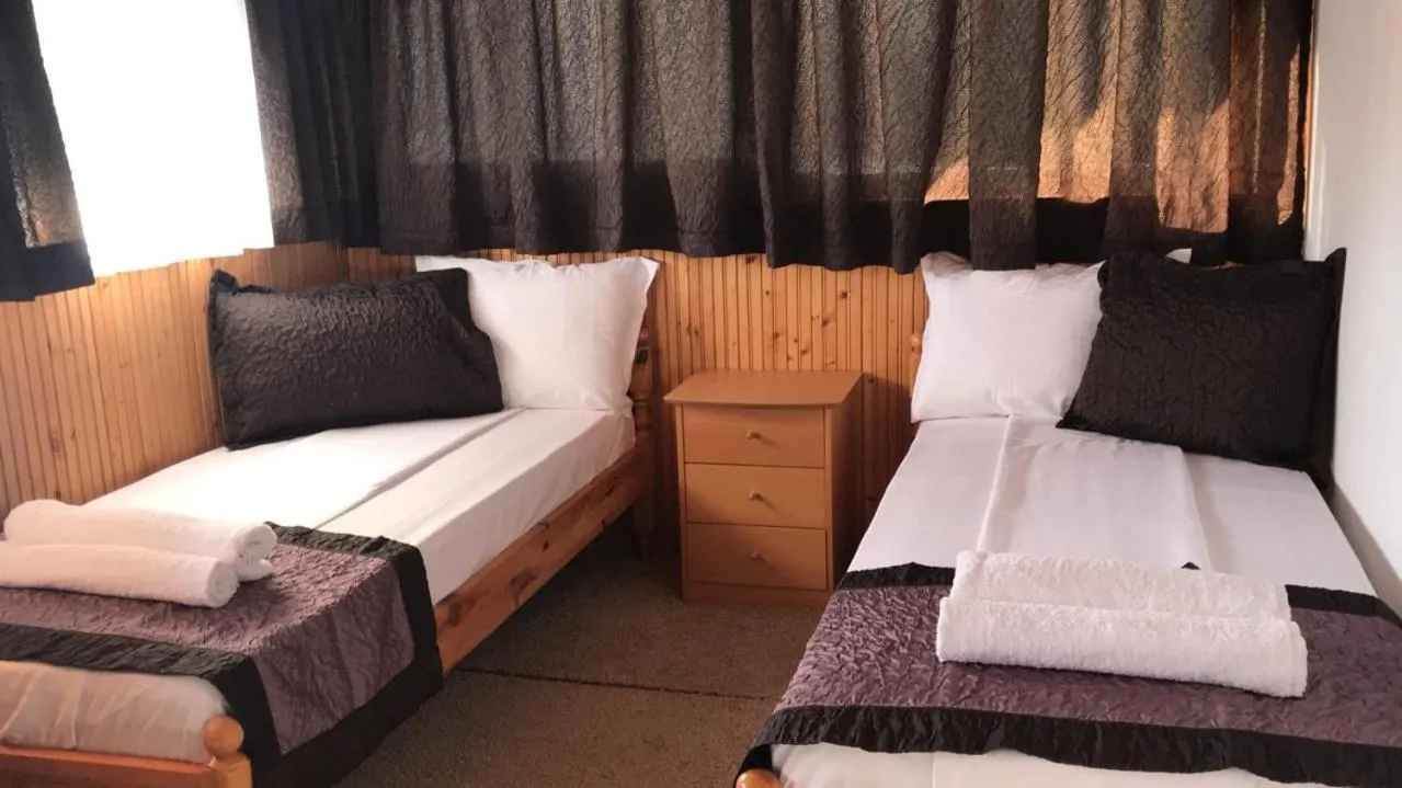 Bed in Aurora Guest House