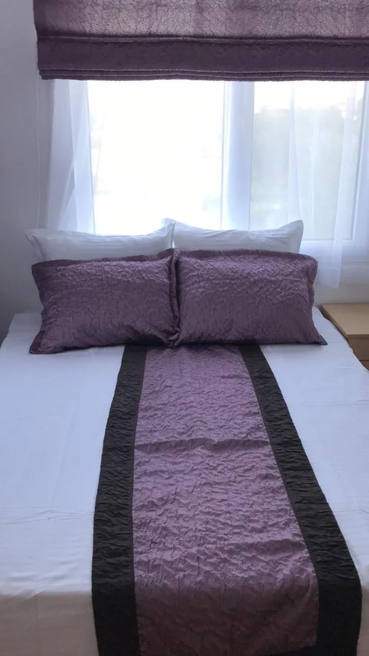 Bed in Aurora Guest House