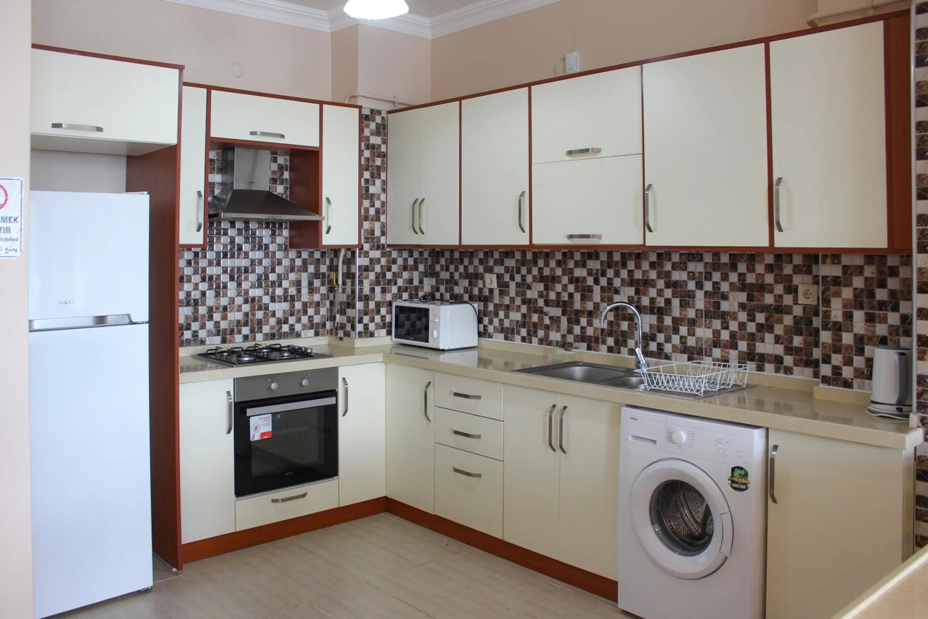 Kitchen or kitchenette in Sawsana Villalari