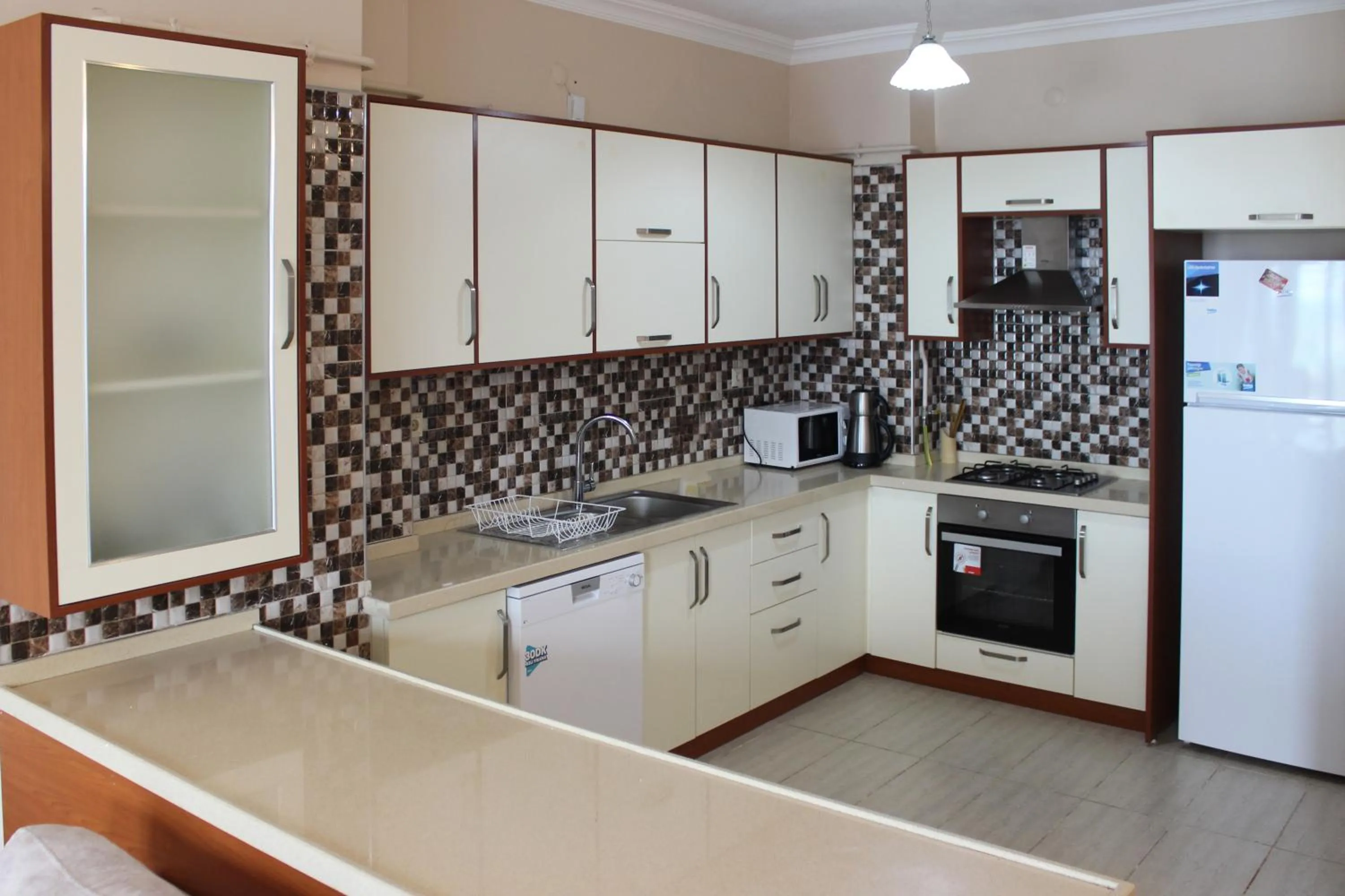 Kitchen or kitchenette in Sawsana Villalari