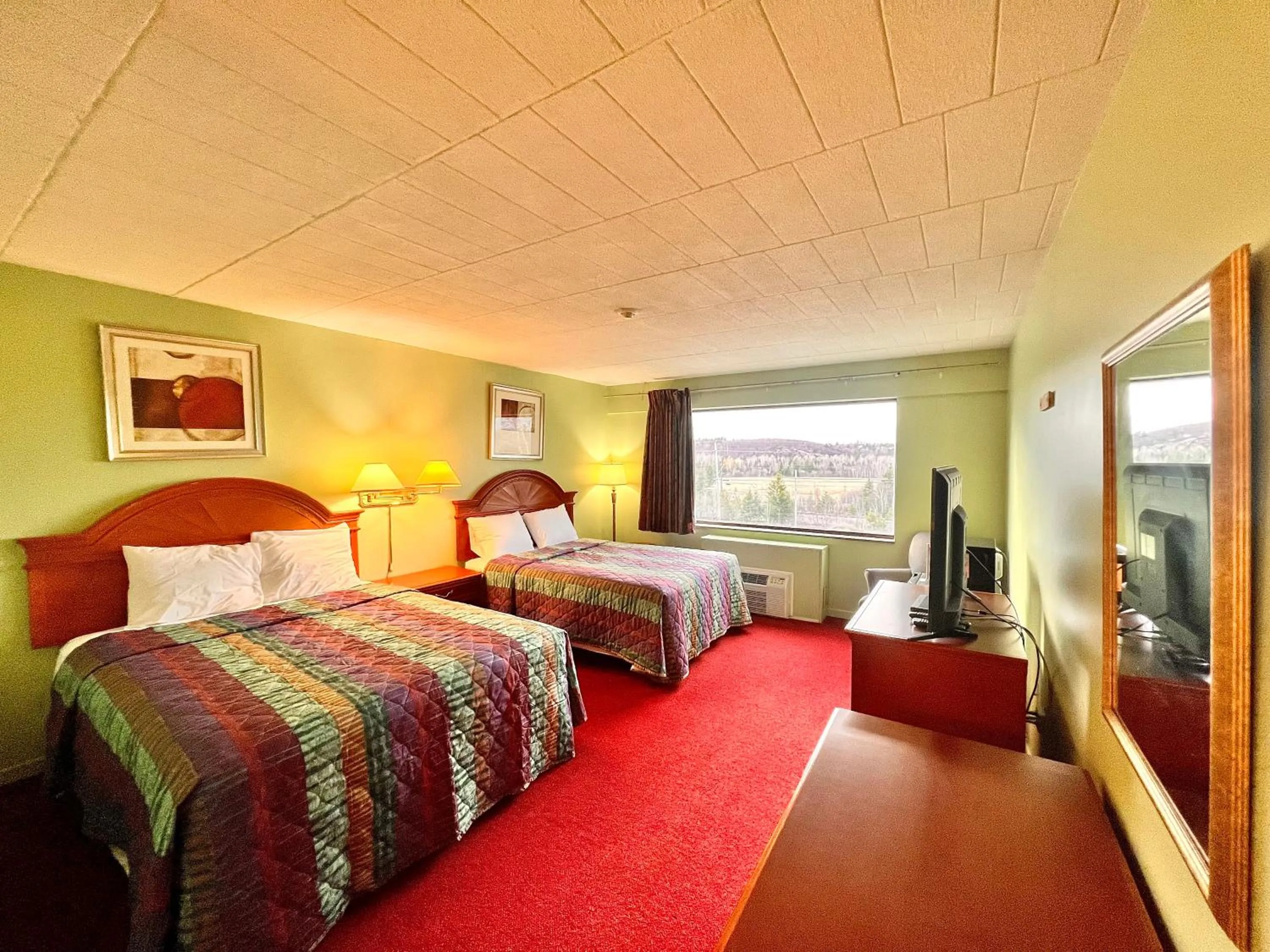 Bed in Lively Inn and Suites - Sudbury