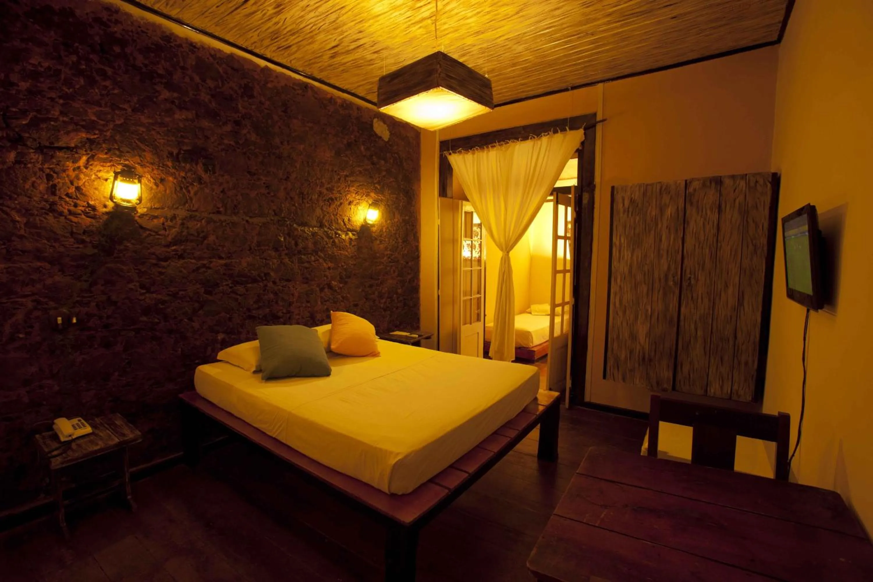 Photo of the whole room, Bed in Pousada Portas da Amazônia