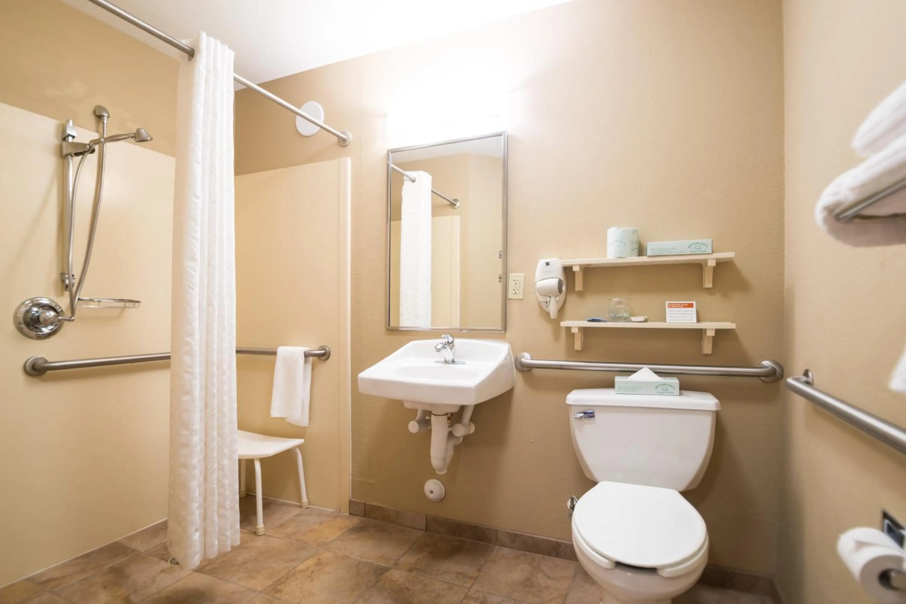 Bathroom in Candlewood Suites Wake Forest-Raleigh Area by IHG