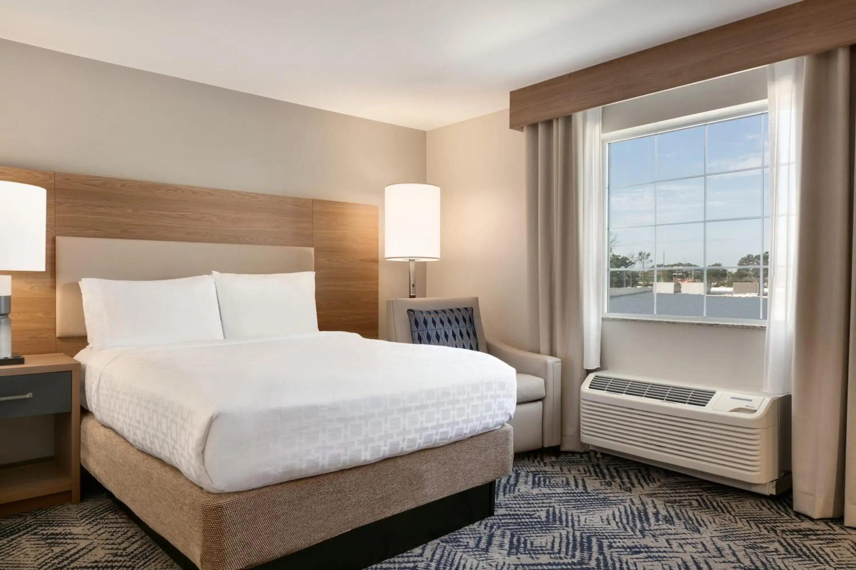 Bedroom, Bed in Candlewood Suites Wake Forest-Raleigh Area by IHG Bedroom, Bed in Candlewood Suites Wake Forest-Raleigh Area by IHG