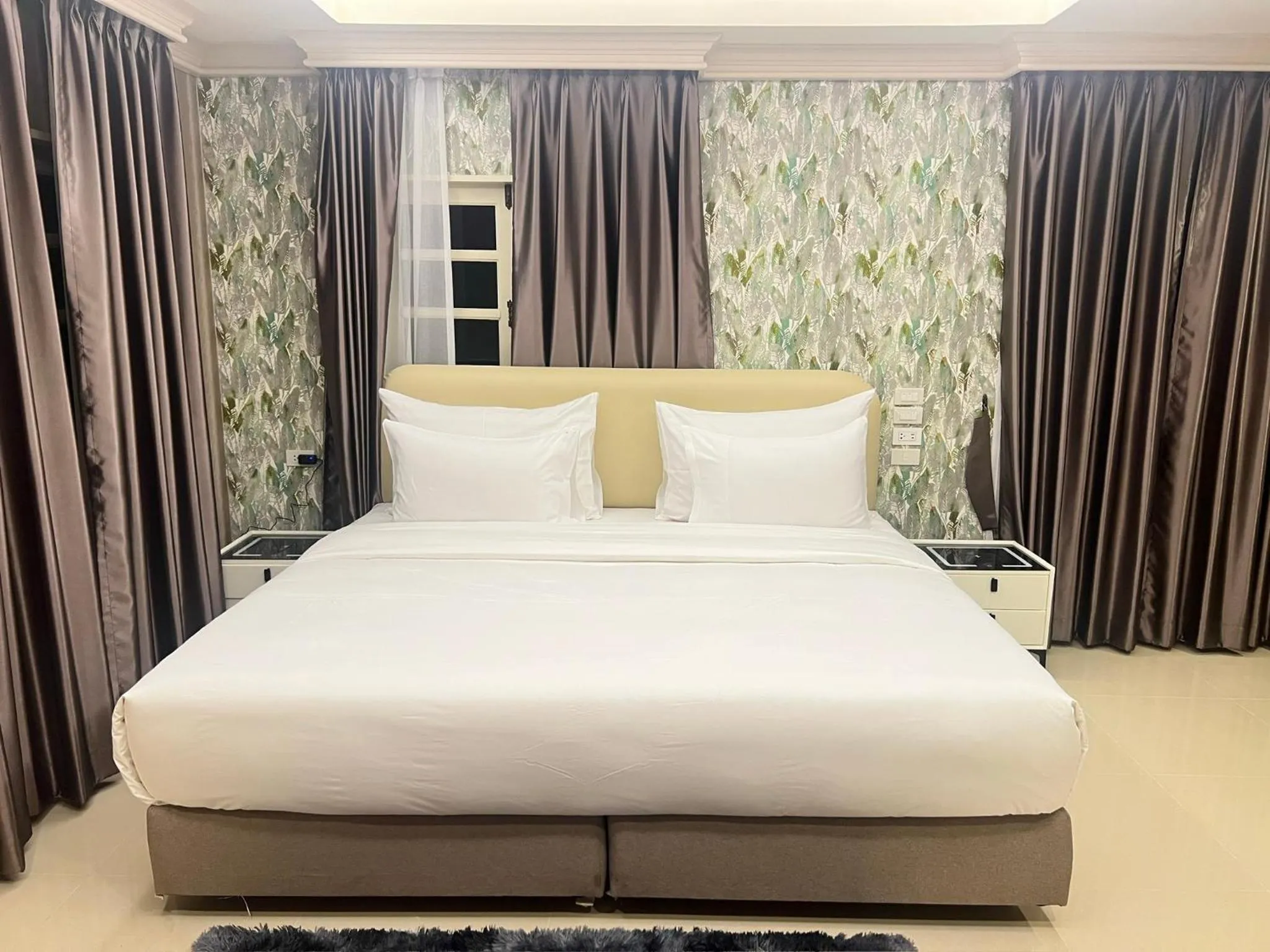 Bed in V20 Boutique Jacuzzi Hotel