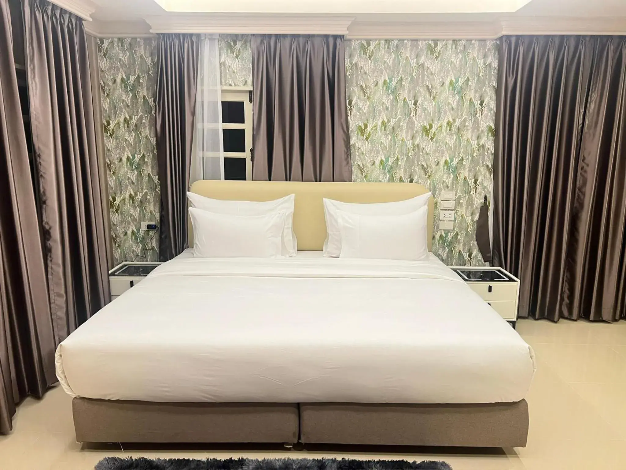 Bed in V20 Boutique Jacuzzi Hotel Bed in V20 Boutique Jacuzzi Hotel