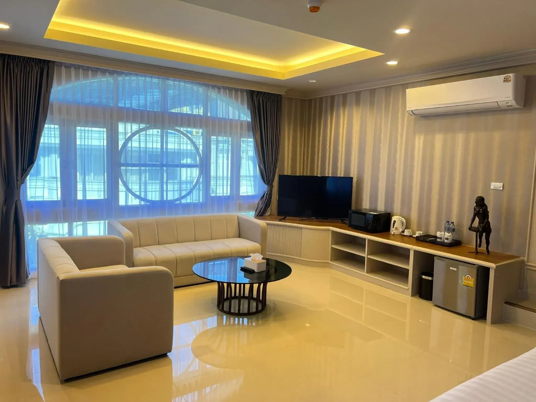 Living room in V20 Boutique Jacuzzi Hotel Living room in V20 Boutique Jacuzzi Hotel