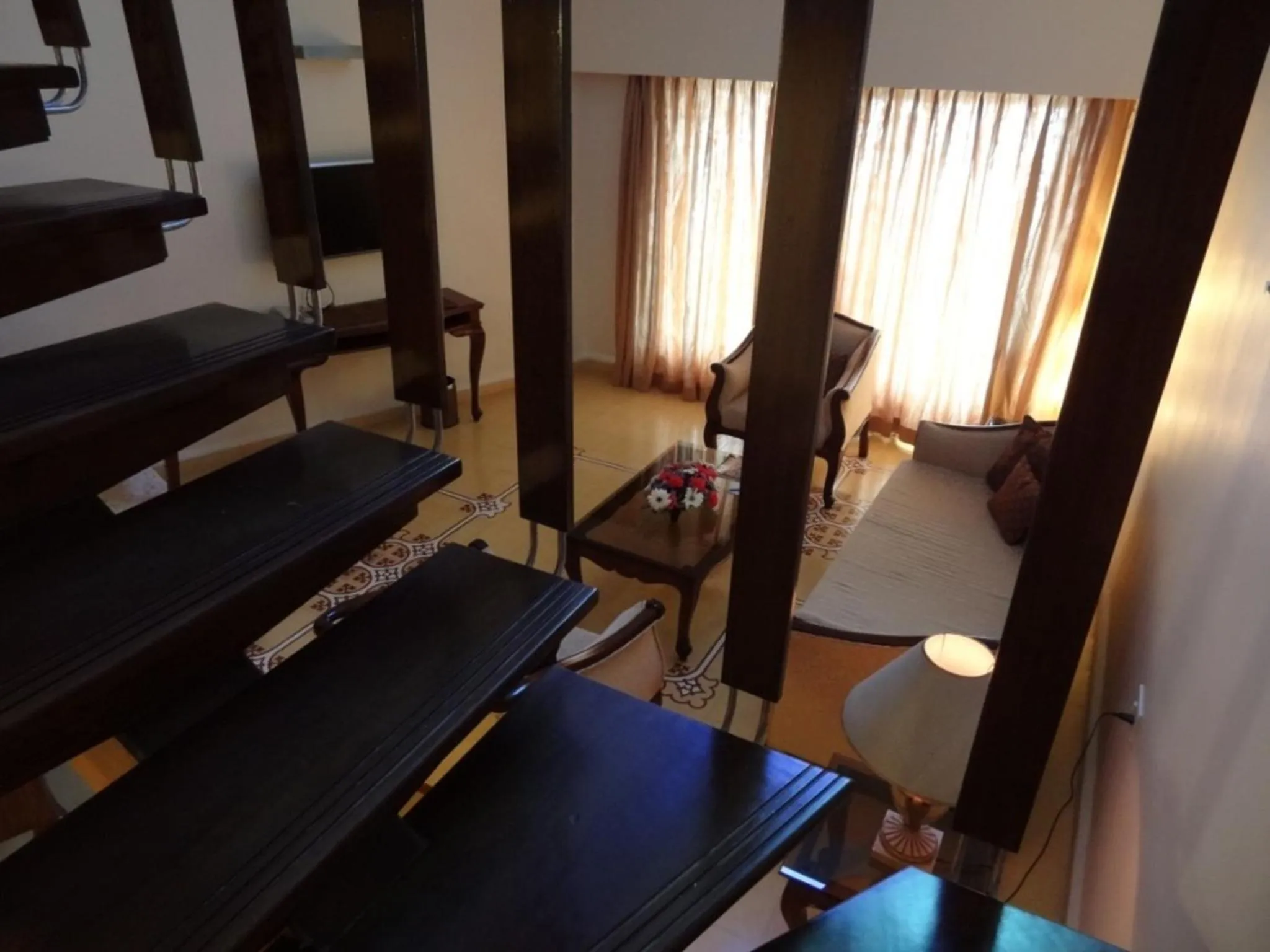 Living room, Bed in The Crown Goa