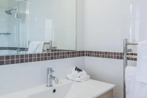 Bathroom in Avana Suites