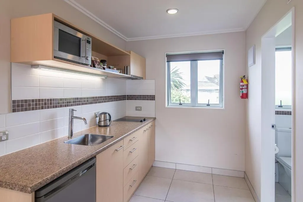 Kitchen or kitchenette in Avana Suites