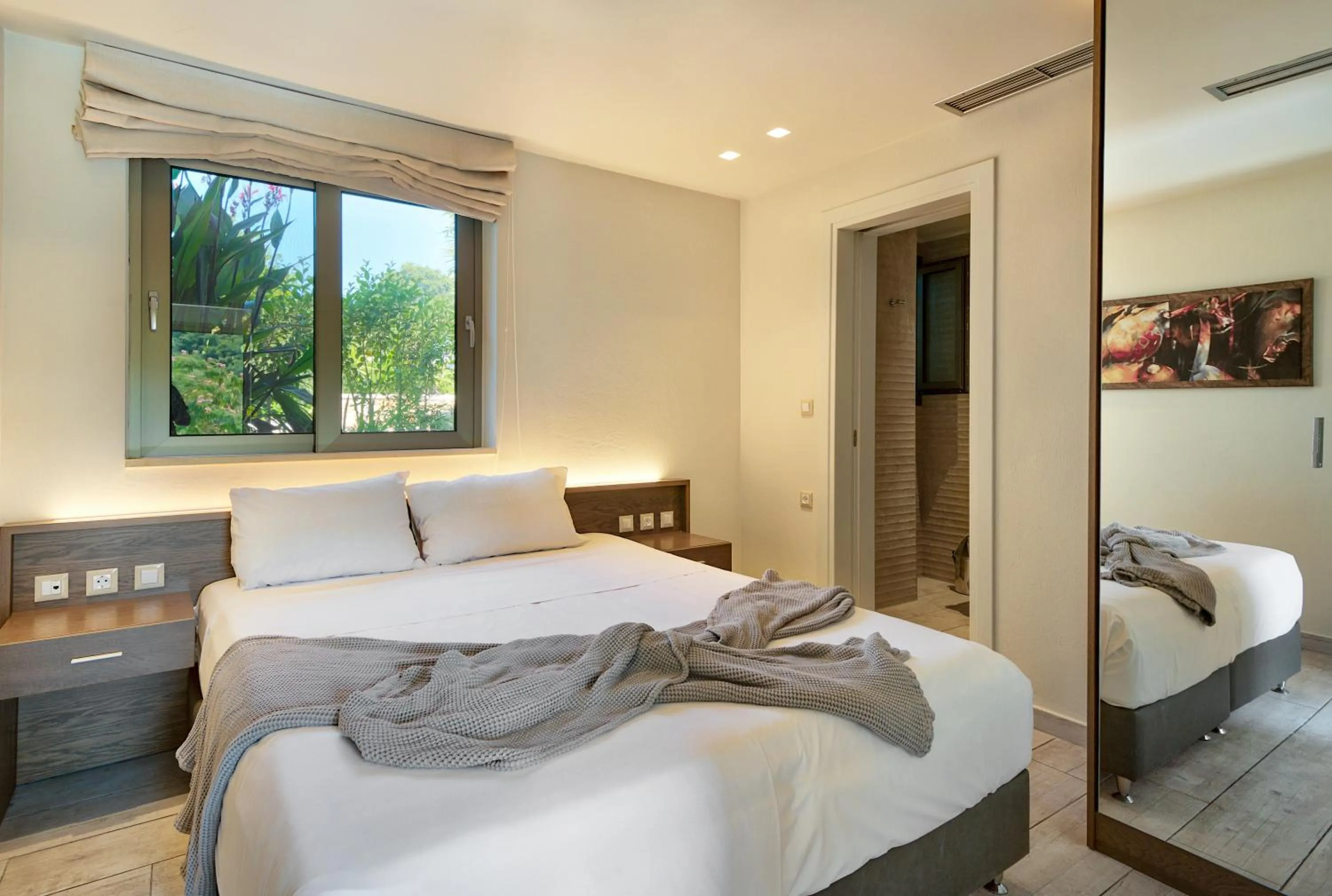 Bed in Prima Vista Beachfront Boutique Hotel