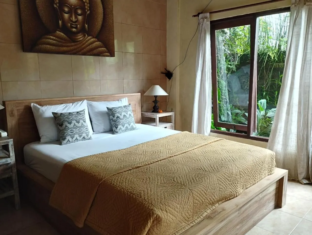 Bed in Umah Ubud Guest House