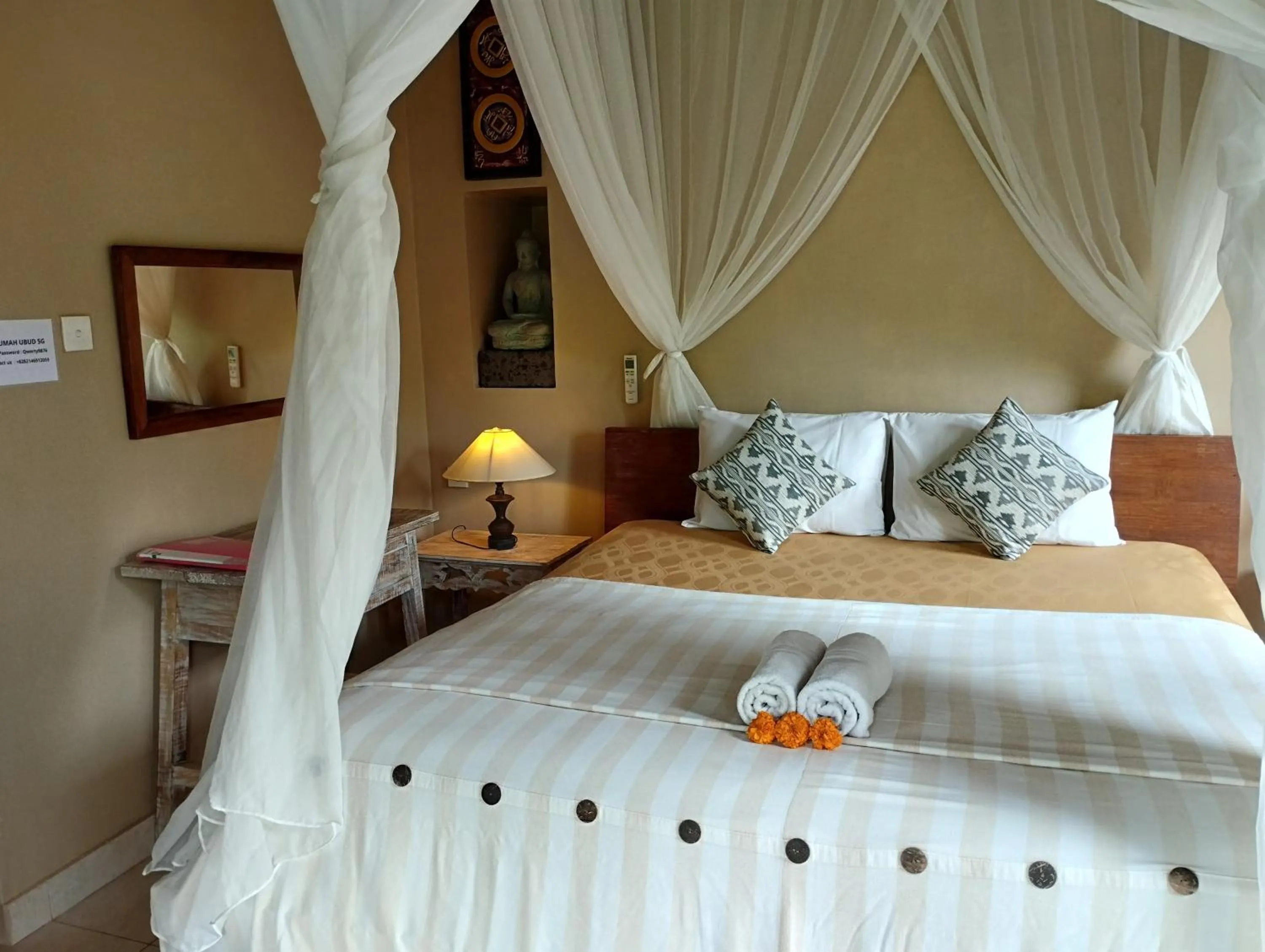 Bed in Umah Ubud Guest House
